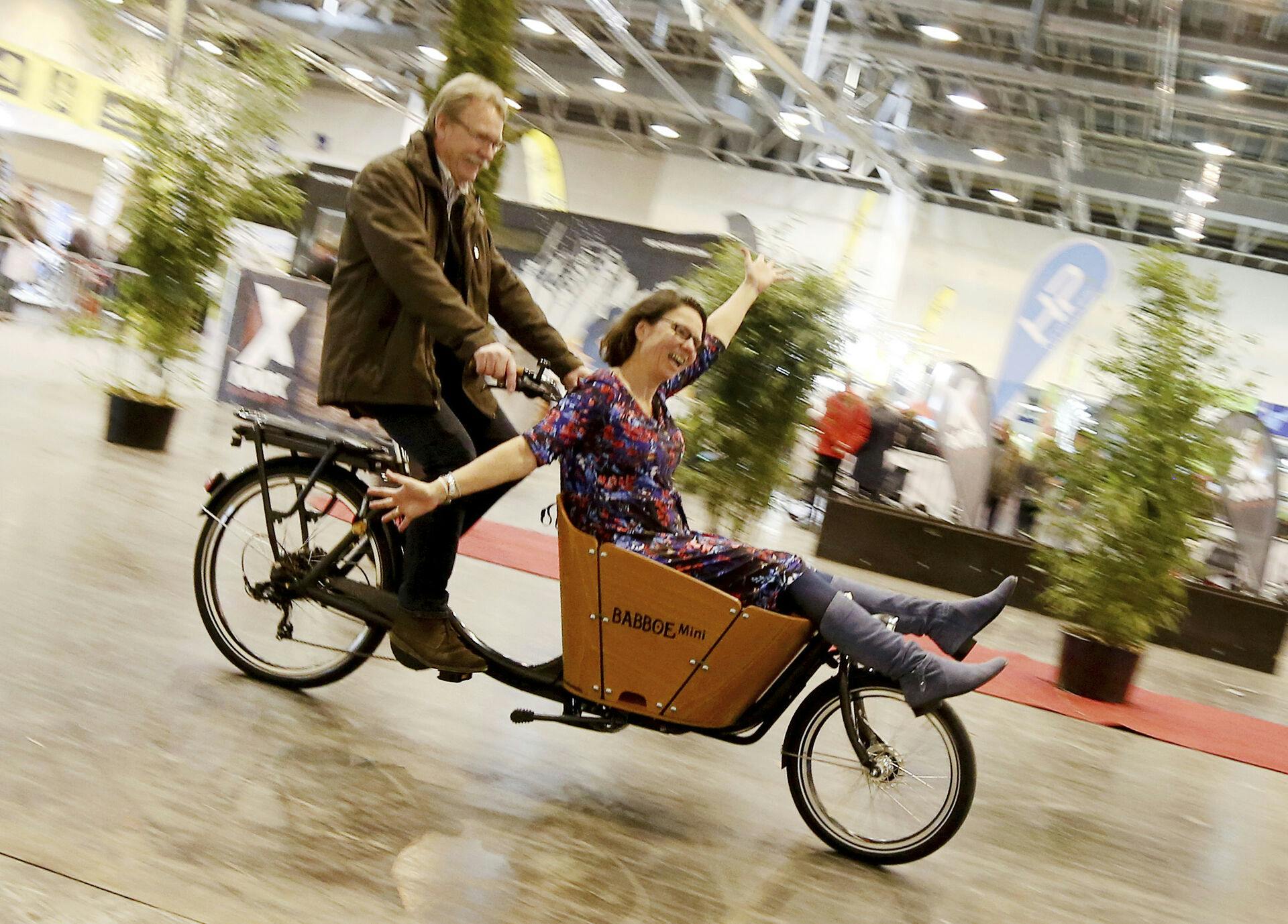 22 February 2018, Germany, Essen: The freight bicycle "Babboe mini E" is tested by two visitors of the fair which will last from the 22nd of February to the 25th of February 2018. Photo by: Roland Weihrauch/picture-alliance/dpa/AP Images