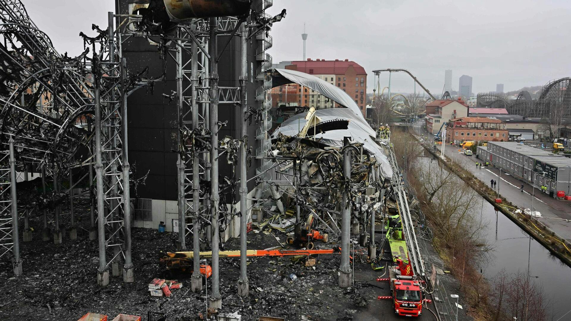 The rescue service works on February 15, 2024 at the burned-out Liseberg Oceana Water World in Gothenburg, after a large fire broke out on February 12, 2024 at the Liseberg amusement park. The Liseberg (Lisa's Mountain) amusement park opened in 1923 during Gothenburg's 300-year anniversary. Liseberg is one of the City of Gothenburg's municipal companies. (Photo by Bjorn LARSSON ROSVALL / TT News Agency / AFP) / Sweden OUT