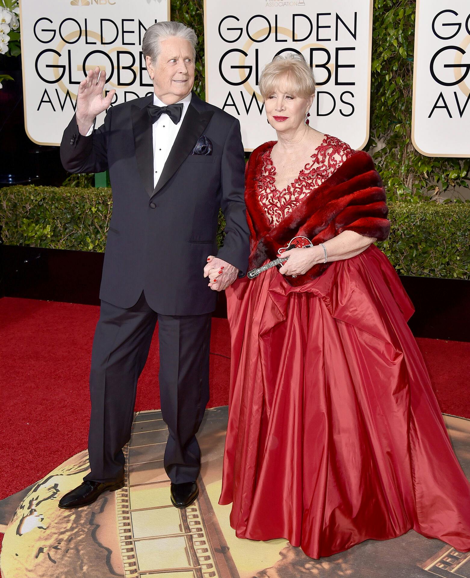 Brian Wilson, left, and Melinda Ledbetter arrive at the 73rd annual Golden Globe Awards on Sunday, Jan. 10, 2016, at the Beverly Hilton Hotel in Beverly Hills, Calif. (Photo by Jordan Strauss/Invision/AP)