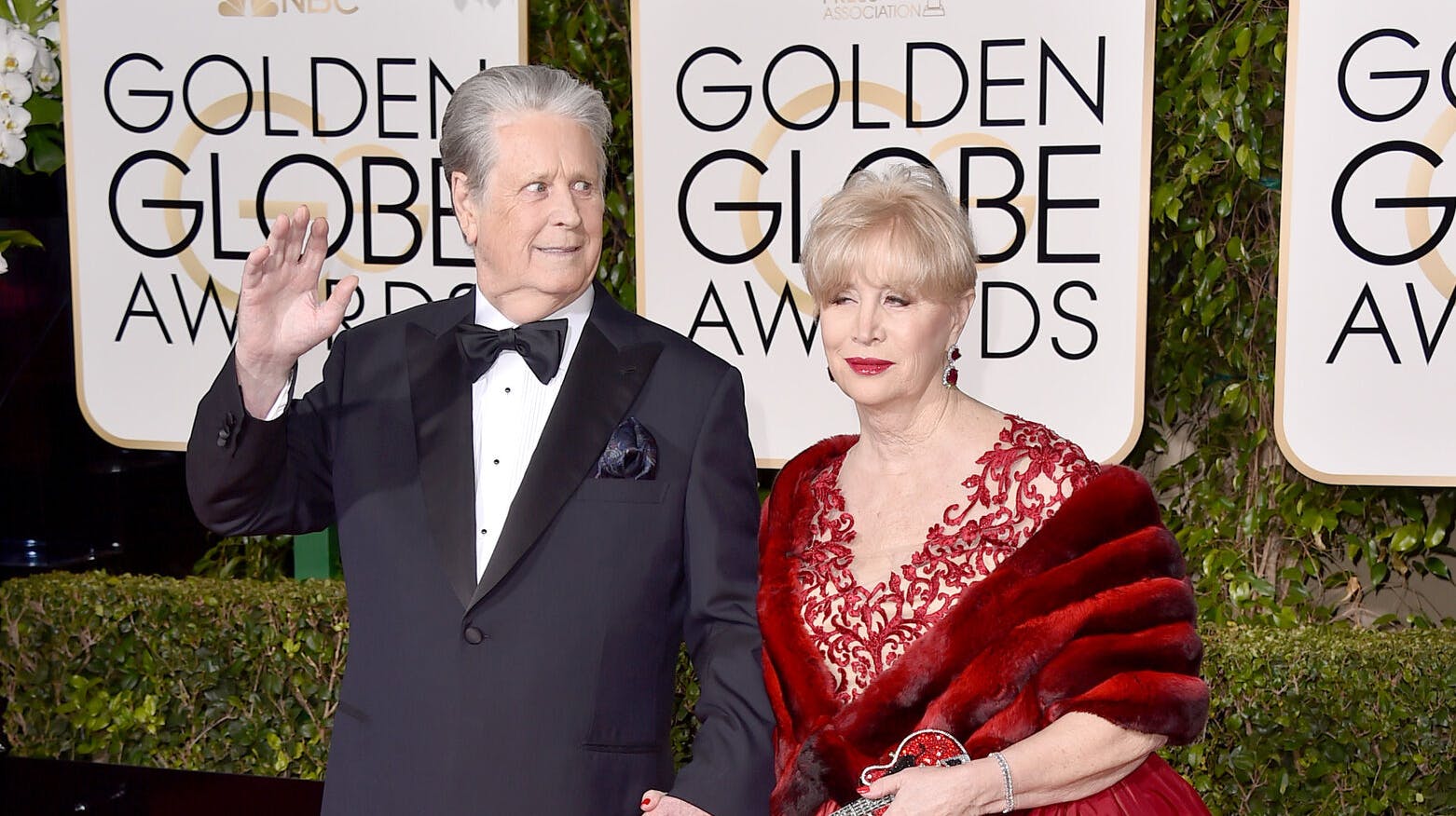 Brian Wilson, left, and Melinda Ledbetter arrive at the 73rd annual Golden Globe Awards on Sunday, Jan. 10, 2016, at the Beverly Hilton Hotel in Beverly Hills, Calif. (Photo by Jordan Strauss/Invision/AP)