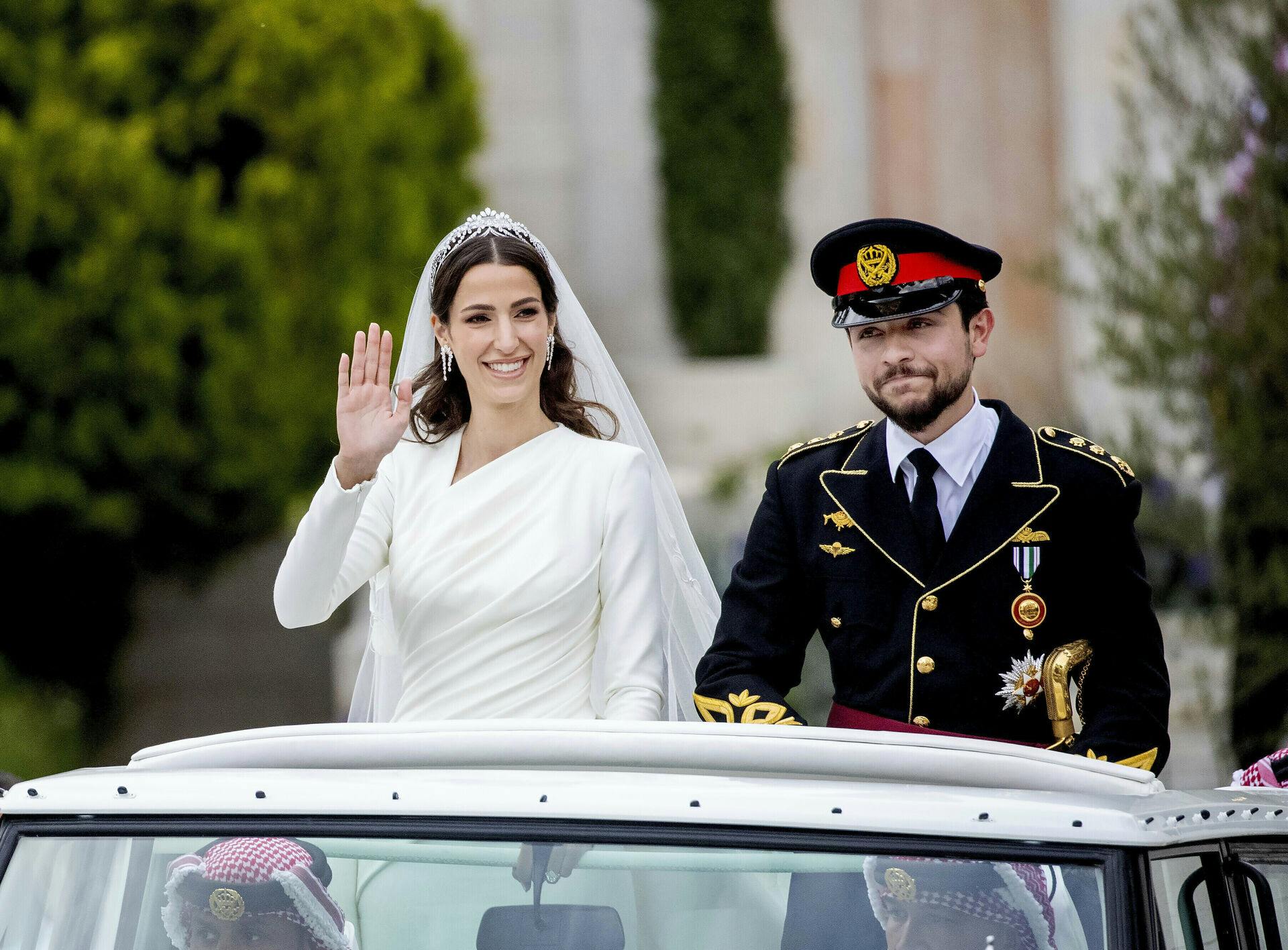 Crown Prince Al Hussein bin Abdullah II of Jordan and Miss Rajwa Alseif leave at the Zahran Palace in Amman, on June 01, 2023, after their Islamic marriage ceremony known as a katb ktab Photo by: Albert Nieboer/picture-alliance/dpa/AP Images