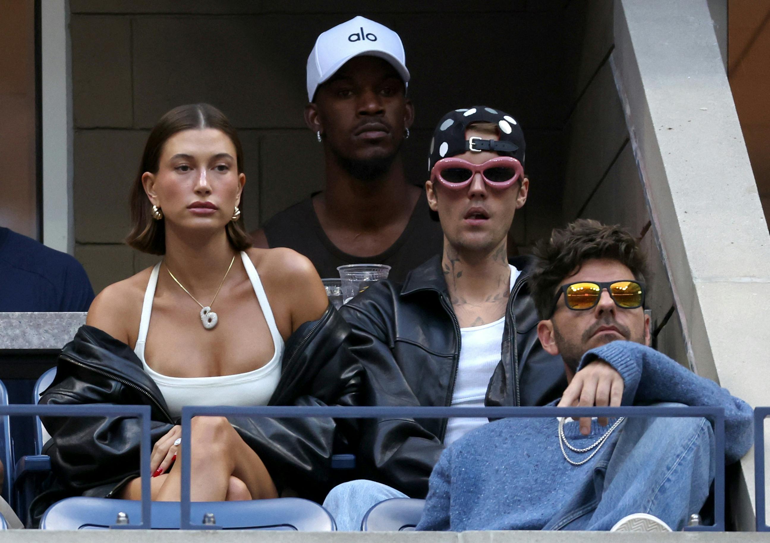 Tennis - U.S. Open - Flushing Meadows, New York, United States - September 1, 2023 Justin Bieber with his wife Hailey Bieber and NBA player Jimmy Butler watch the third round match between Coco Gauff of the U.S. and Belgium's Elise Mertens REUTERS/Shannon Stapleton TPX IMAGES OF THE DAY
