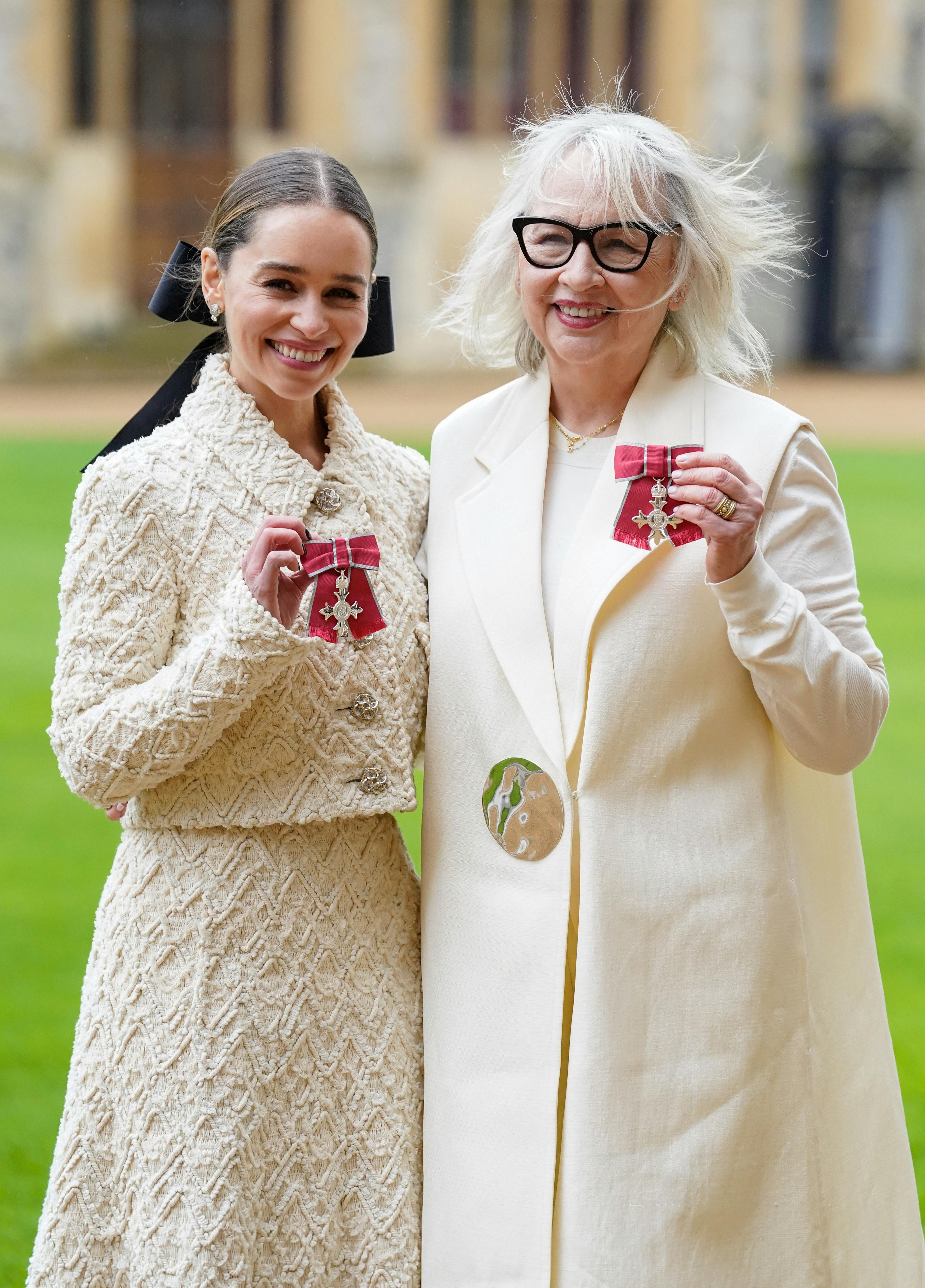 Emilia Clarke and her mother Jennifer Clarke, co-founders and trustees of SameYou, pose after being made Members of the Order of the British Empire during an investiture ceremony at Windsor Castle, Berkshire, Britain, February 21, 2024. Andrew Matthews/Pool via REUTERS