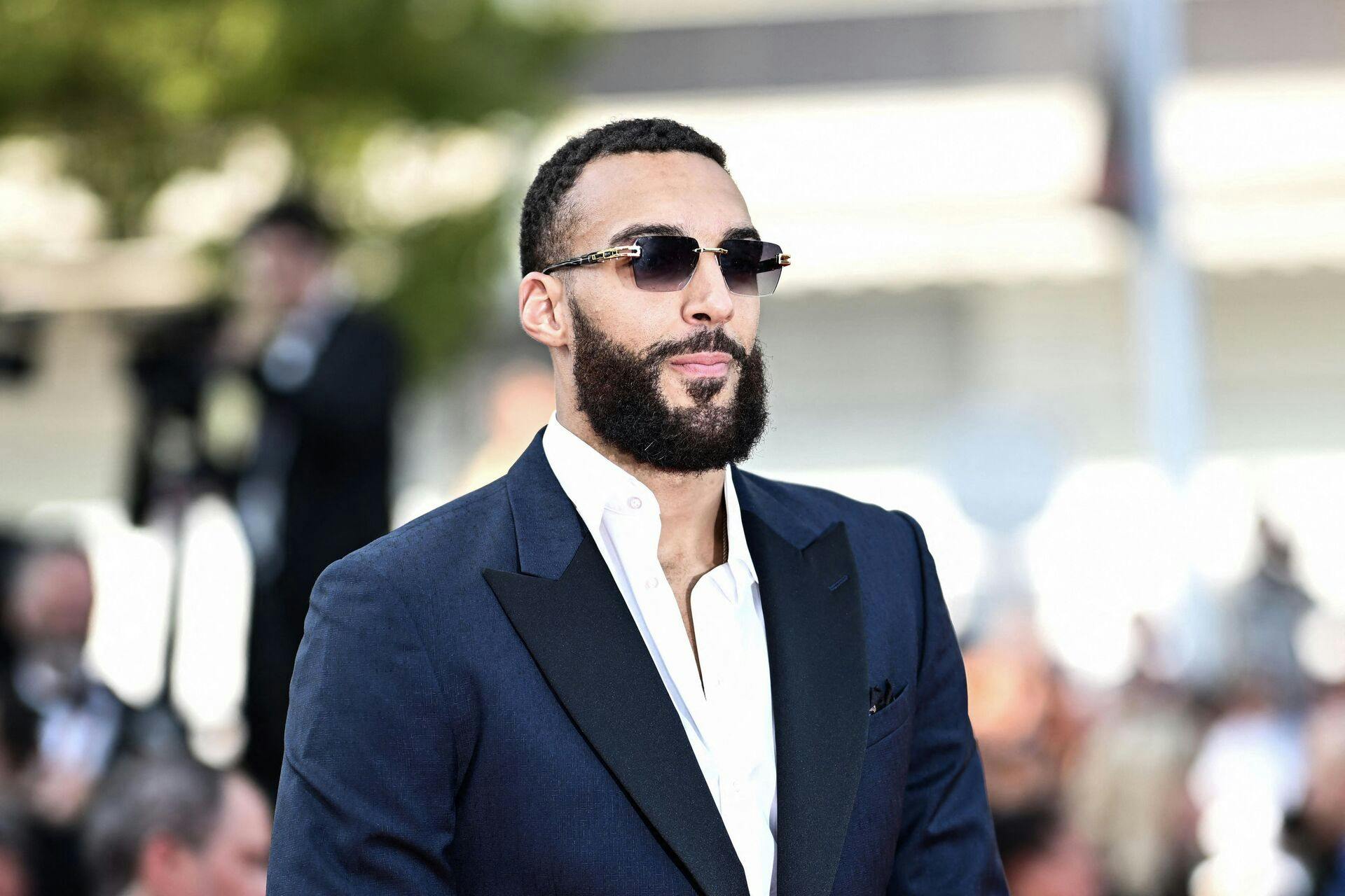French basketball player Rudy Gobert arrives for the screening of the film Asteroid City during the 76th edition of the Cannes Film Festival in Cannes, southern France, on May 23, 2023. (Photo by LOIC VENANCE / AFP)