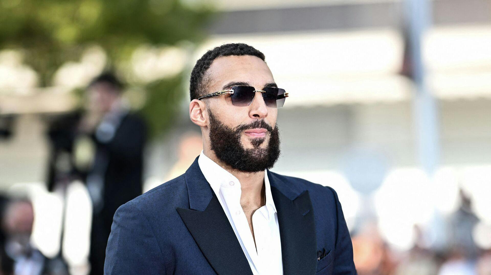 French basketball player Rudy Gobert arrives for the screening of the film Asteroid City during the 76th edition of the Cannes Film Festival in Cannes, southern France, on May 23, 2023. (Photo by LOIC VENANCE / AFP)