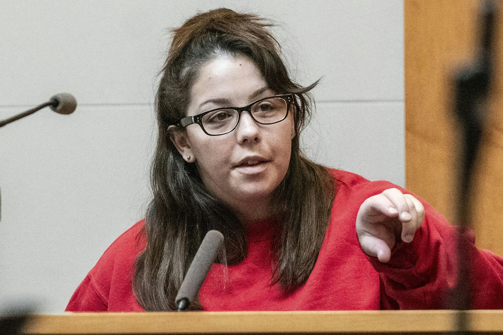 Kayla Montgomery gestures while testifying during the trial of Adam Montgomery at Hillsborough County Superior Court, Monday Feb. 12, 2024, in Manchester, N.H. Adam Montgomery is accused of killing his 5-year-old daughter and spending months moving her body before disposing of it. (Jeffrey Hastings/Pool Photo via AP)