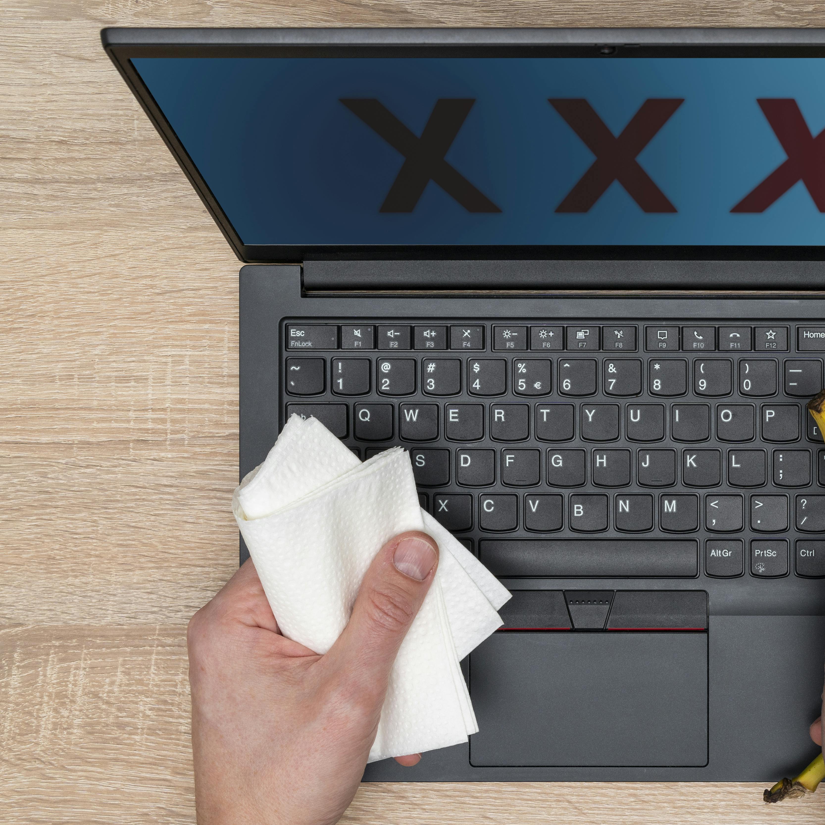 XXX written on laptop monitor.Online pornography, porn addicted. Internet porn concept.
