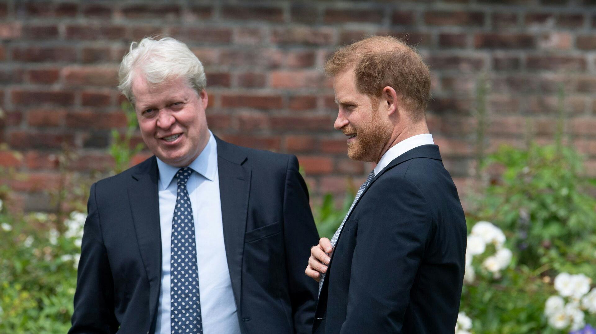 Prins Harry med sin onkel Earl Charles Spencer. 