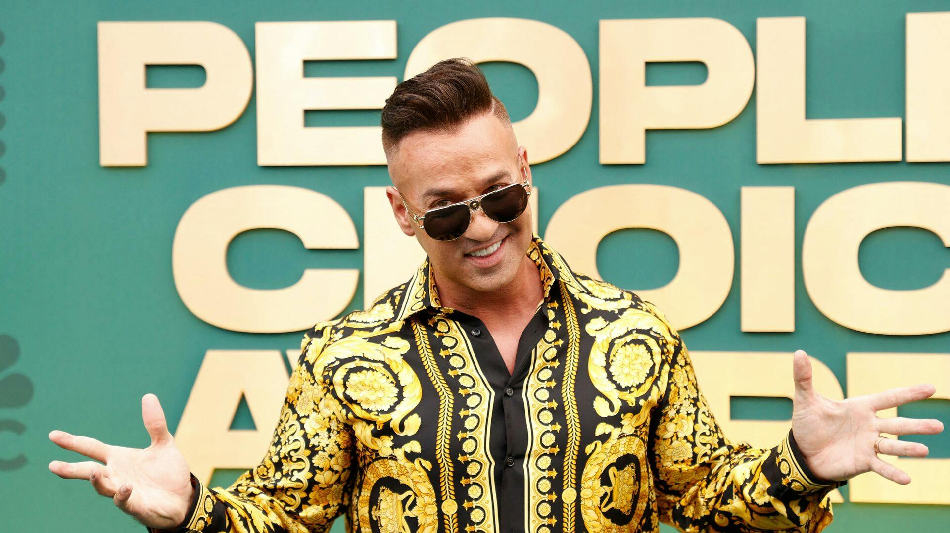 US TV personality Mike "The Situation" Sorrentino arrives for the 2024 People's Choice awards at the Barker Hangar in Santa Monica, California, February 18, 2024. (Photo by Michael TRAN / AFP)
