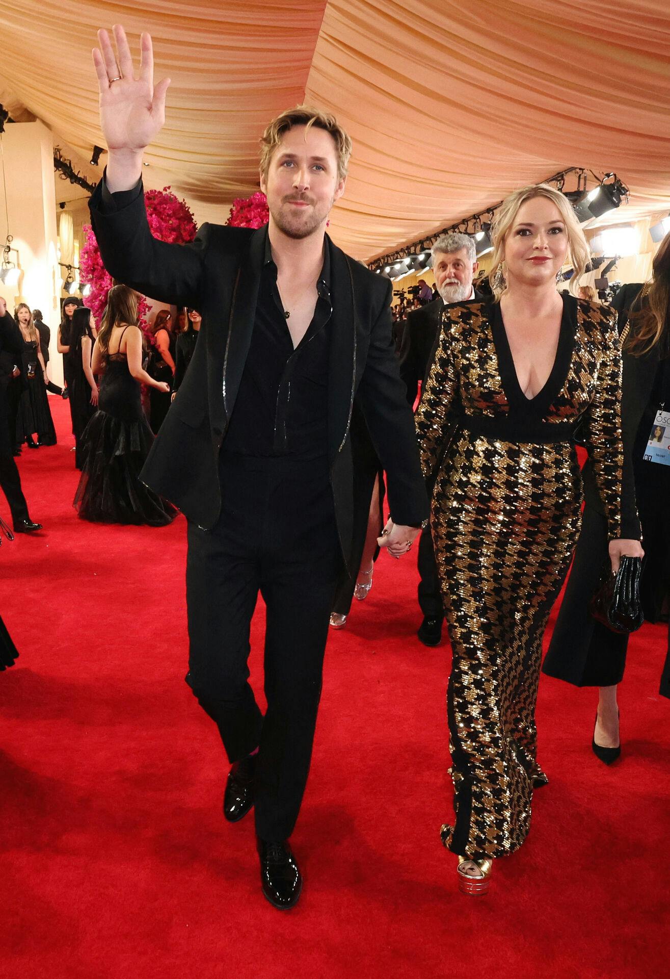Ryan Gosling og Mandi på den røde løber til nattens Oscar-uddeling.