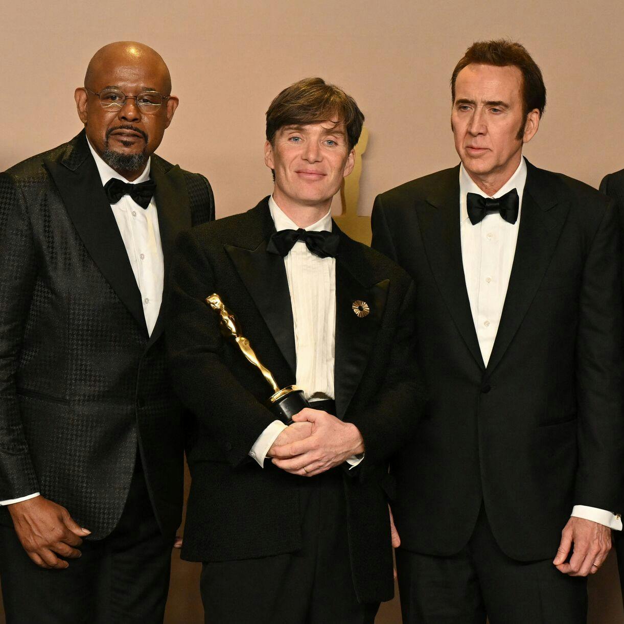 TOPSHOT - Actors Matthew McConaughey, Forest Whitaker, Nicolas Cage and Brendan Fraser pose Irish actor Cillian Murphy winner of the Oscar for Best Actor in a Leading Role for "Oppenheimer" during the 96th Annual Academy Awards at the Dolby Theatre in Hollywood, California on March 10, 2024. (Photo by Robyn BECK / AFP)