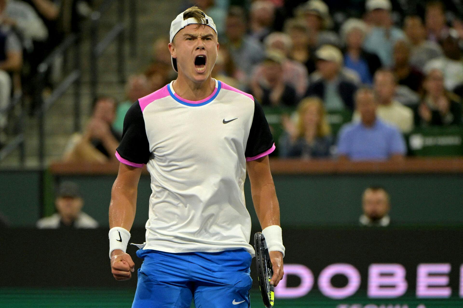 Mar 13, 2024; Indian Wells, CA, USA; Holger Rune (DEN) celebrates at match point defeating Taylor Fritz (USA) in the fourth round of the BNP Paribas Open at the Indian Wells Tennis Garden. Mandatory Credit: Jayne Kamin-Oncea-USA TODAY Sports