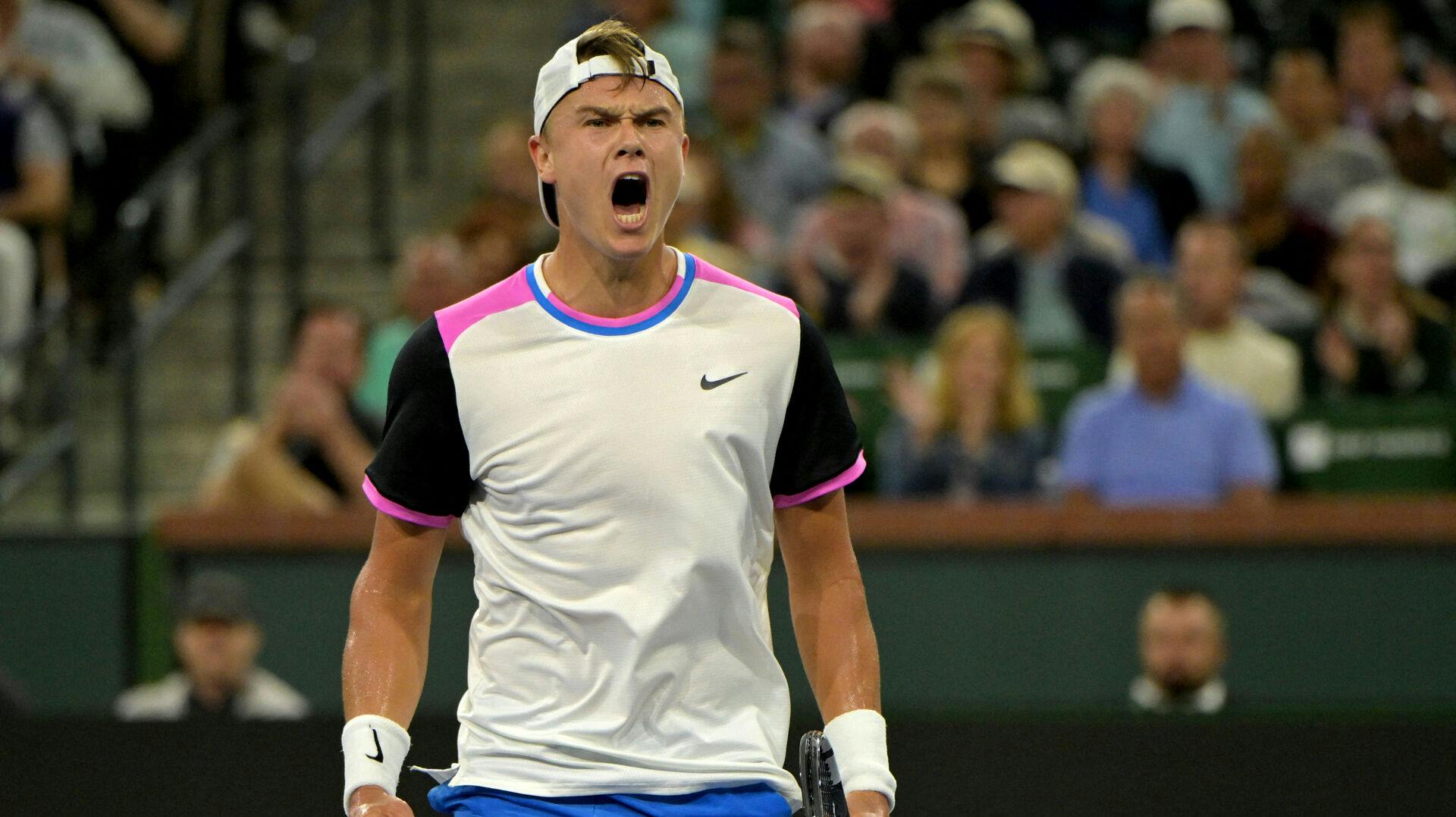 Mar 13, 2024; Indian Wells, CA, USA; Holger Rune (DEN) celebrates at match point defeating Taylor Fritz (USA) in the fourth round of the BNP Paribas Open at the Indian Wells Tennis Garden. Mandatory Credit: Jayne Kamin-Oncea-USA TODAY Sports