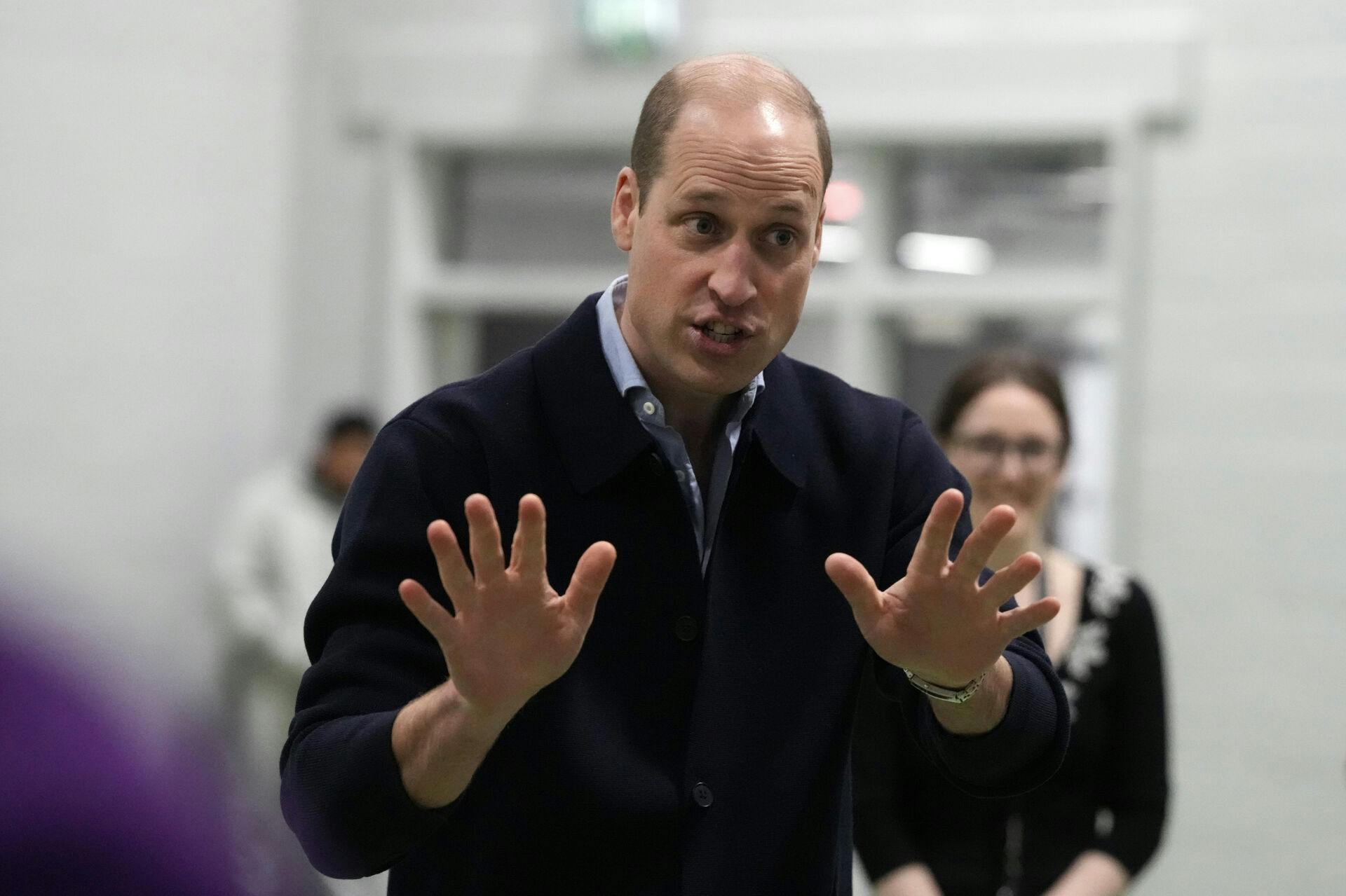 Prince William gestures during his visit to WEST, the new OnSide Youth Zone in Hammersmith and Fulham in London, Thursday, March 14, 2024. Named WEST (standing for 'Where Everyone Sticks Together') by local young people, the new Youth Zone will be staffed by skilled and dedicated youth workers who will support young people from across west London to develop the skills and confidence they need to achieve their dreams. (AP Photo/Frank Augstein, Pool)