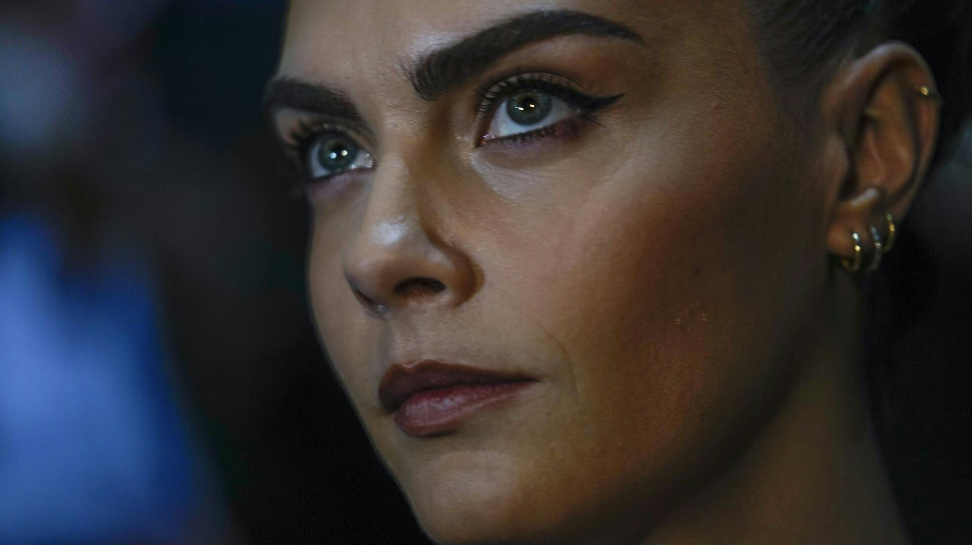 Cara Delevingne attends the Emporio Armani women's Spring Summer 2024 collection presented in Milan, Italy, Thursday, Sept. 21, 2023. (AP Photo/Luca Bruno)