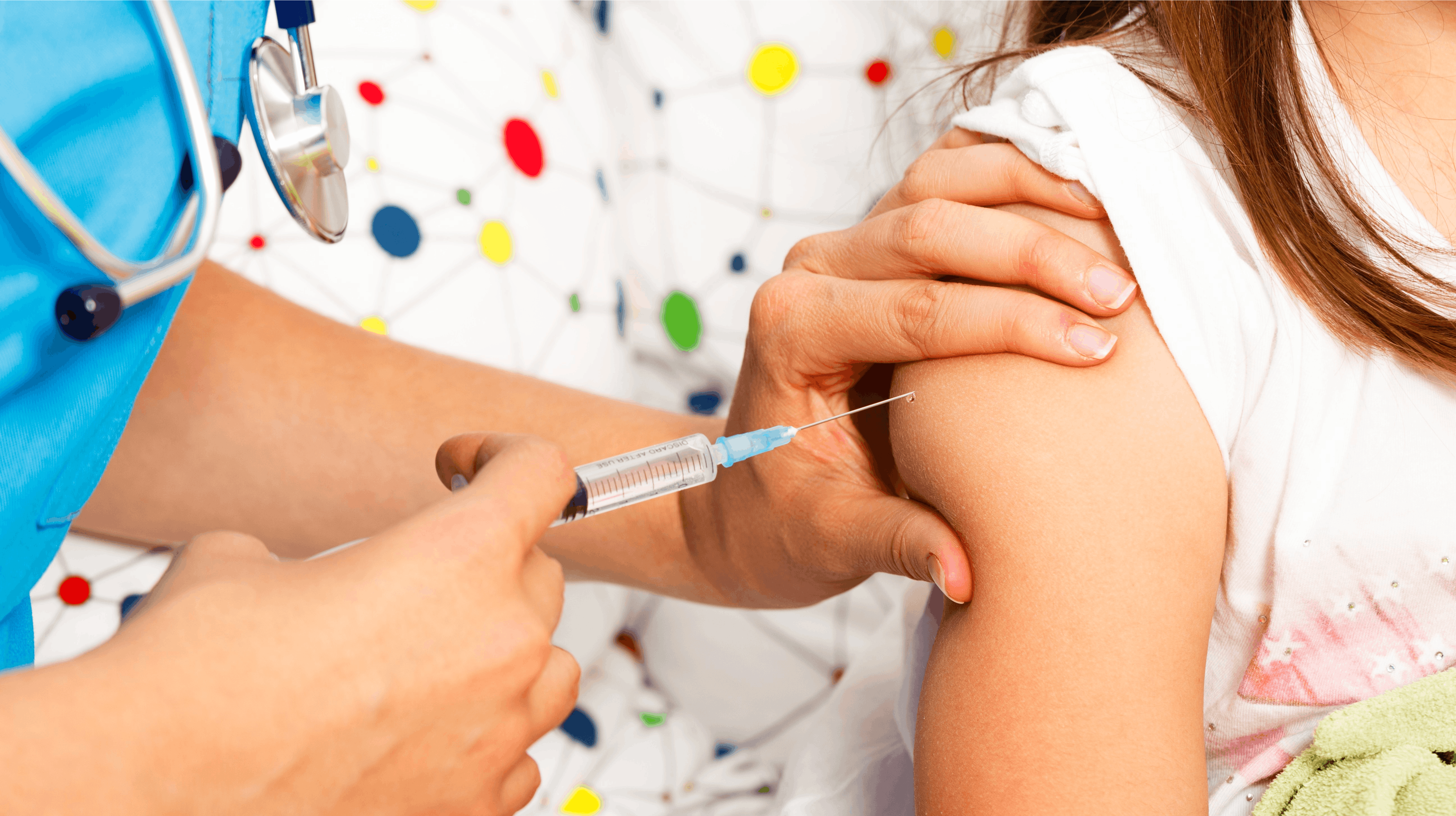 Close-up of little patient receiving annual vaccination for immunization.