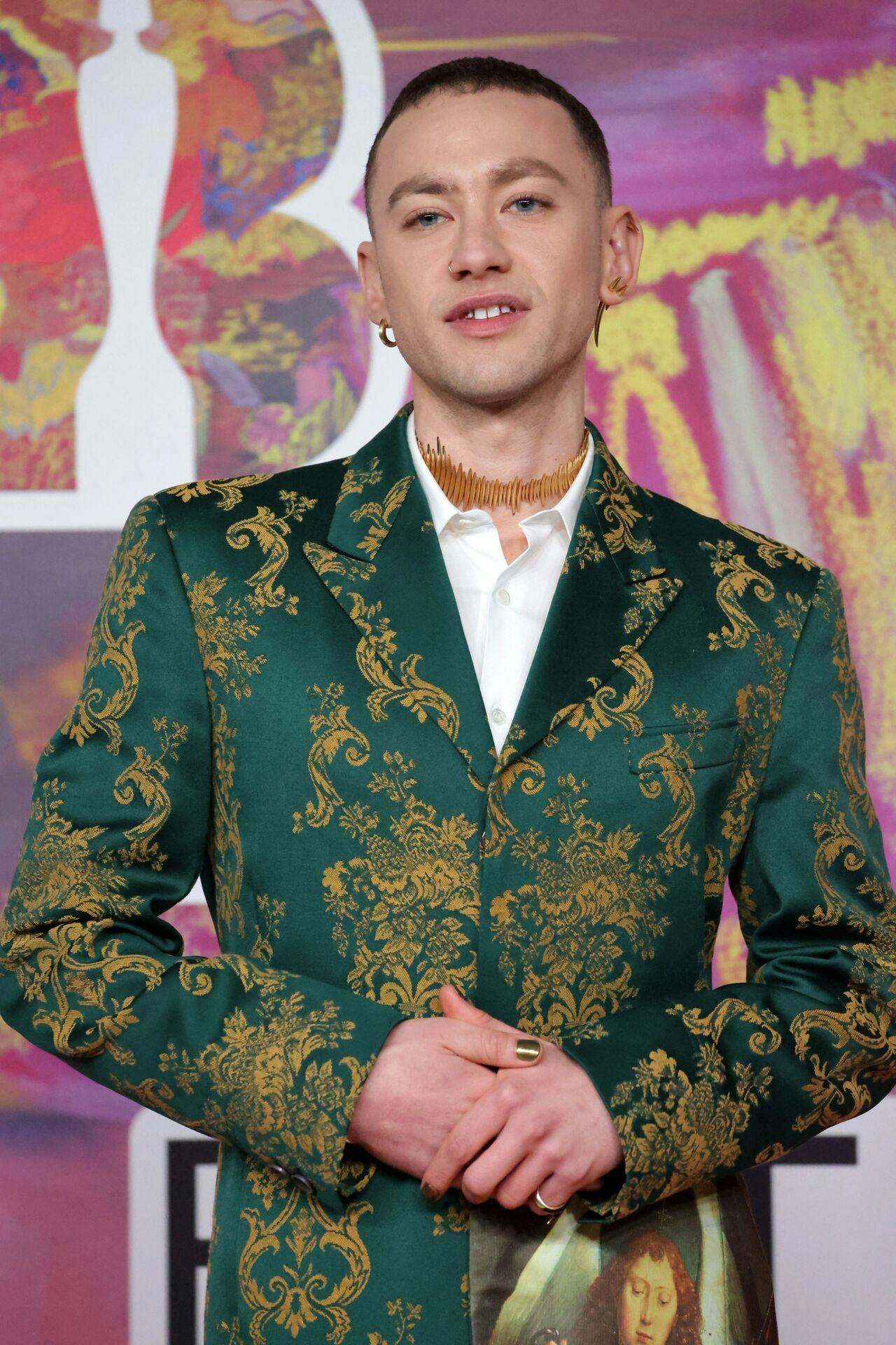 British singer Olly Alexander poses on the red carpet upon arrival for the BRIT Awards 2024 in London on March 2, 2024. (Photo by CARLOS JASSO / AFP) / RESTRICTED TO EDITORIAL USE - NO POSTERS - NO MERCHANDISE- NO USE IN PUBLICATIONS DEVOTED TO ARTISTS