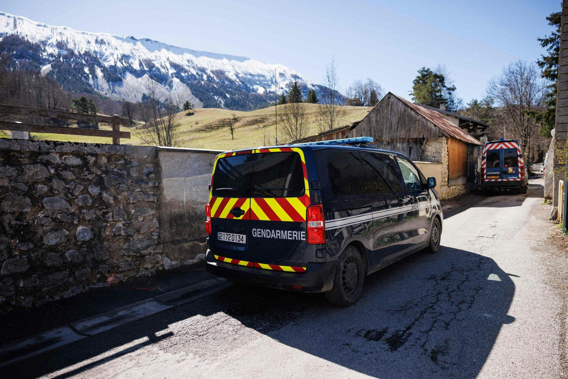 Vehicles of the gendarmerie run through the French southern Alps tiny village of Le Haut-Vernet, in Le Vernet on April 2, 2024, two days after French investigators have found the "bones" of a toddler who went missing last summer. The discovery is the first major breakthrough in the case of two-and-a-half-year-old Emile, who vanished on July 8 last year while staying with his grandparents. (Photo by CLEMENT MAHOUDEAU / AFP)