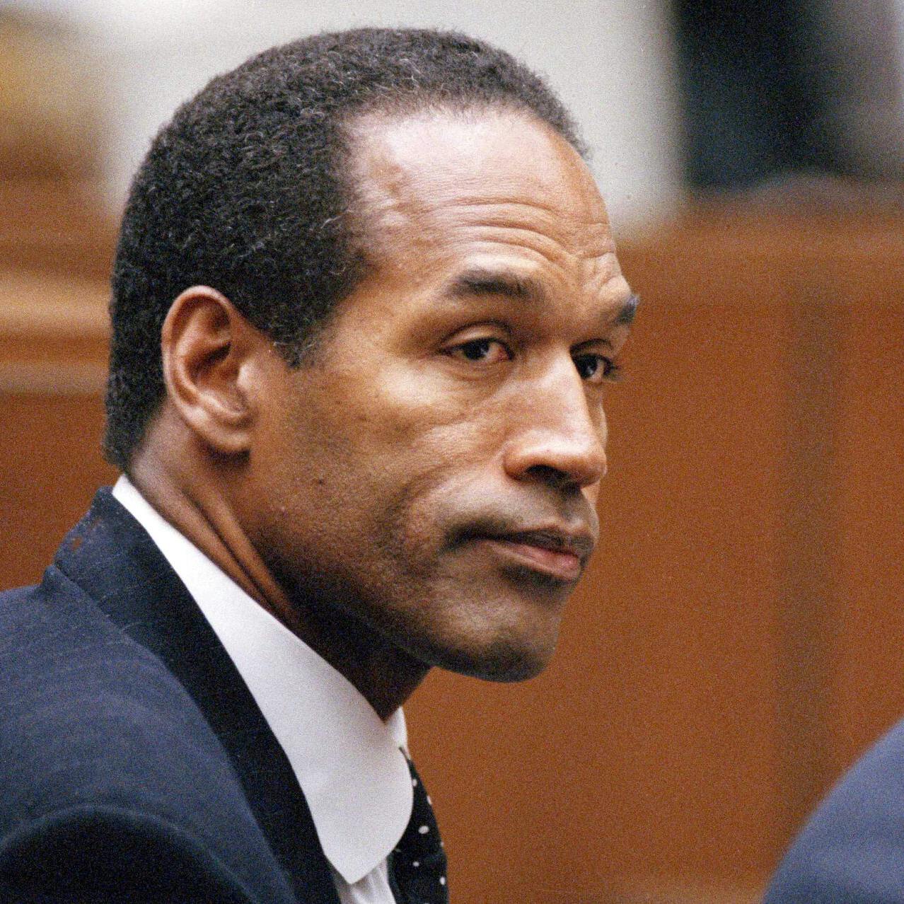 FILE - O.J. Simpson sits at his arraignment in Superior Court in Los Angeles on July 22, 1994, where he pleaded "absolutely, 100 percent not guilty" on murder charges. Simpson, the decorated football superstar and Hollywood actor who was acquitted of charges he killed his former wife and her friend but later found liable in a separate civil trial, died Wednesday, April 11, 2024, of prostate cancer. He was 76. (AP Photo/Pool/Lois Bernstein, Pool)