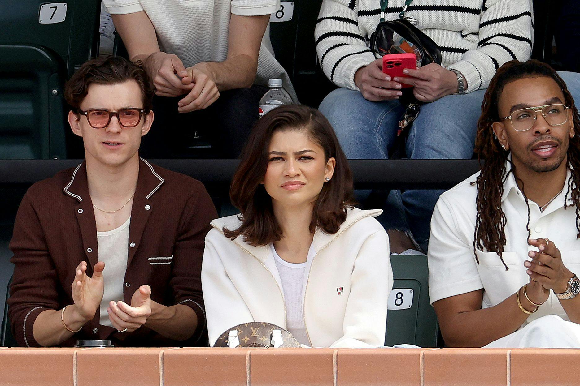 INDIAN WELLS, CALIFORNIA - MARCH 17: Tom Holland and Zendaya watches Carlos Alcaraz of Spain play Daniil Medvedev of Russia during the Men's Final of the BNP Paribas Open at Indian Wells Tennis Garden on March 17, 2024 in Indian Wells, California. Matthew Stockman/Getty Images/AFP (Photo by MATTHEW STOCKMAN / GETTY IMAGES NORTH AMERICA / Getty Images via AFP)