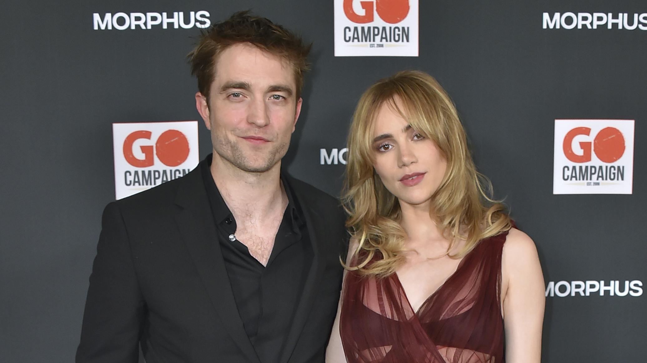Robert Pattinson, left, and Suki Waterhouse arrive at the GO Campaign's annual GO Gala on Saturday, Oct. 21, 2023, in Los Angeles. (Photo by Jordan Strauss/Invision/AP)