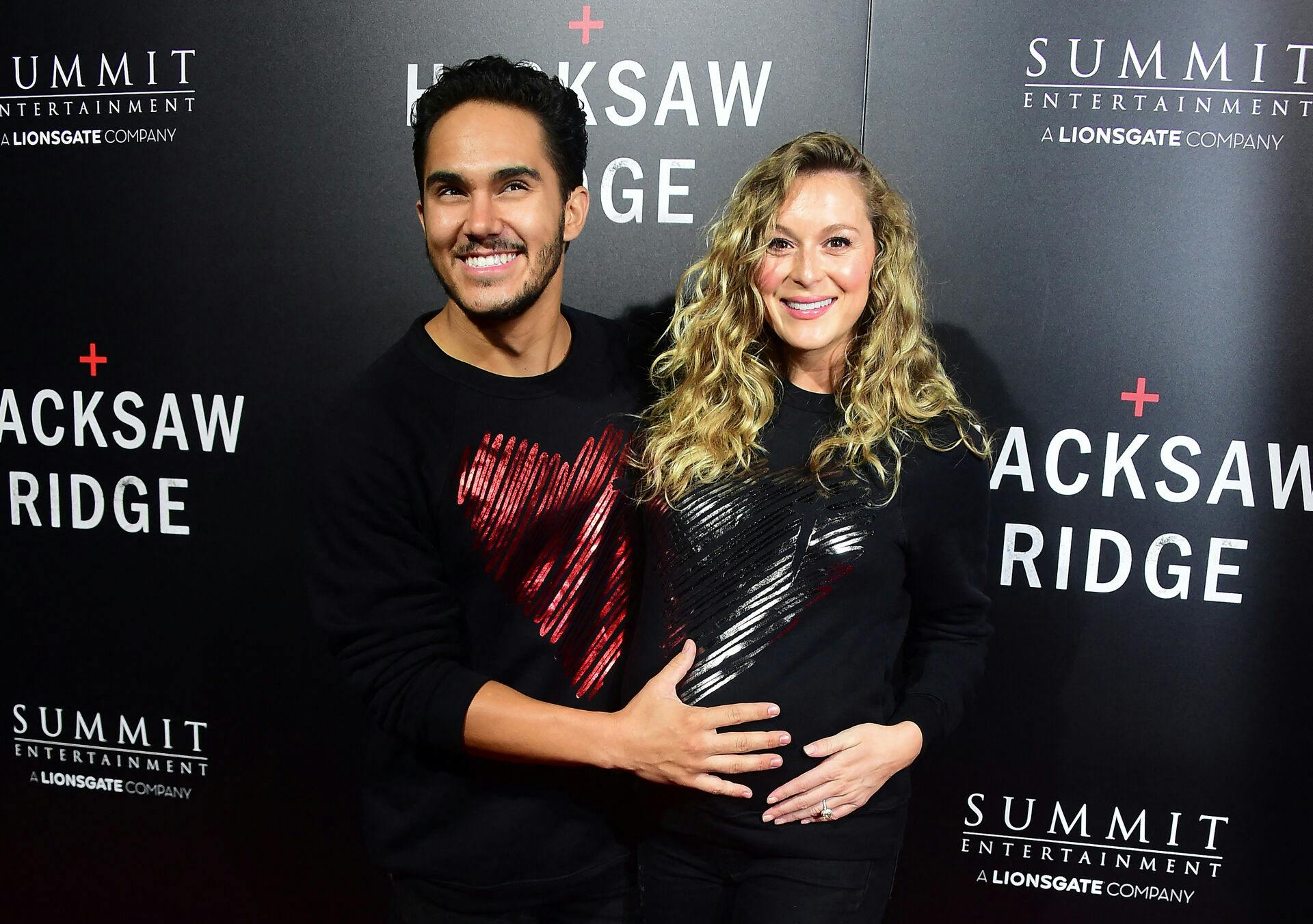 Carlos and Alexa Penavega pose on arrival for the Los Angeles special screening of the film 'Hacksaw Ridge' at the Samuel Goldwyn Theater in Beverly Hills, California on October 24, 2016. . Frederic J. BROWN / AFP