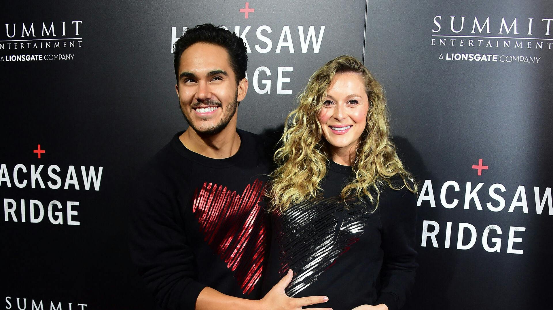 Carlos and Alexa Penavega pose on arrival for the Los Angeles special screening of the film 'Hacksaw Ridge' at the Samuel Goldwyn Theater in Beverly Hills, California on October 24, 2016. . Frederic J. BROWN / AFP