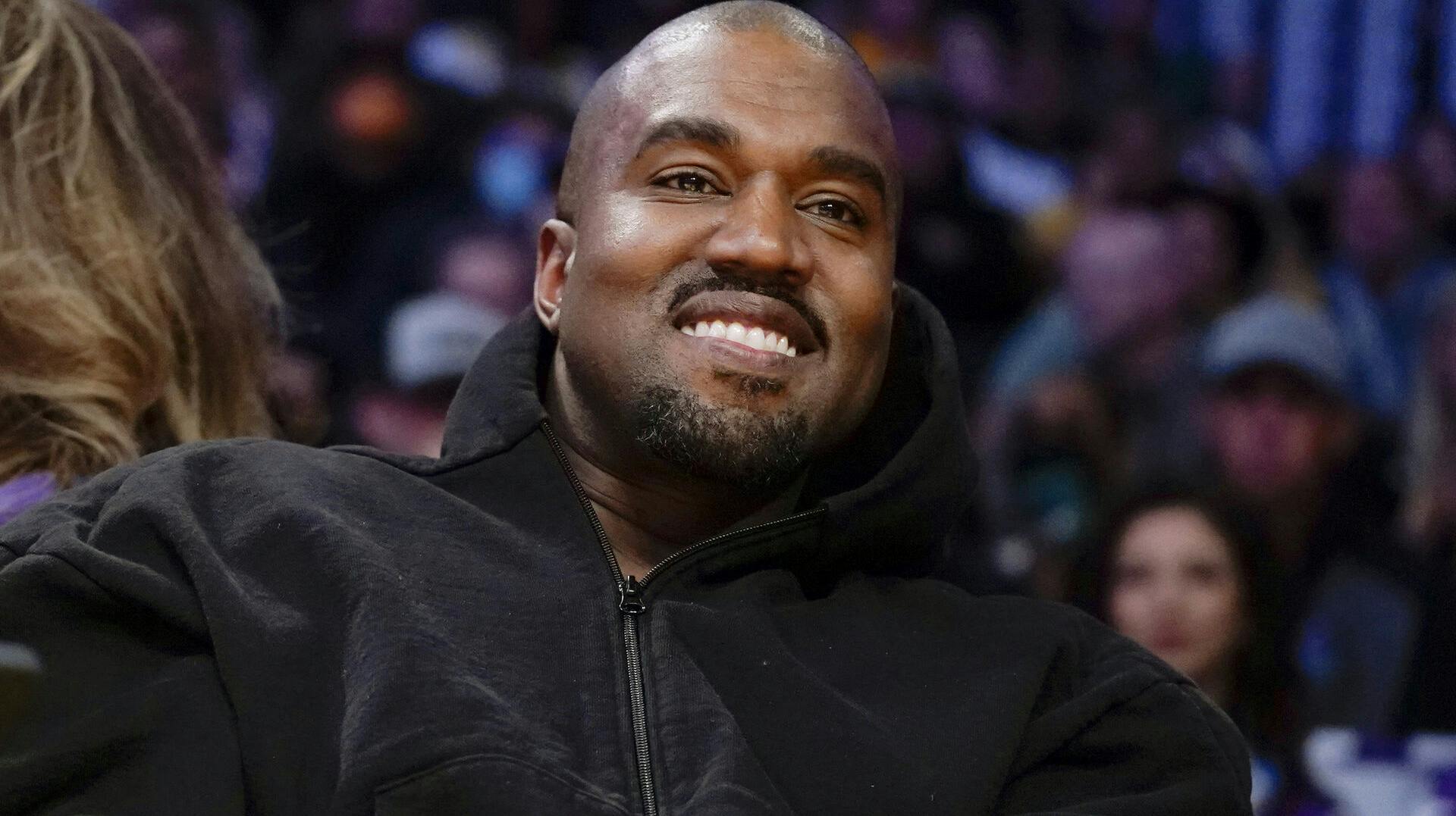 FILE - Kanye West, known as Ye, watches the first half o