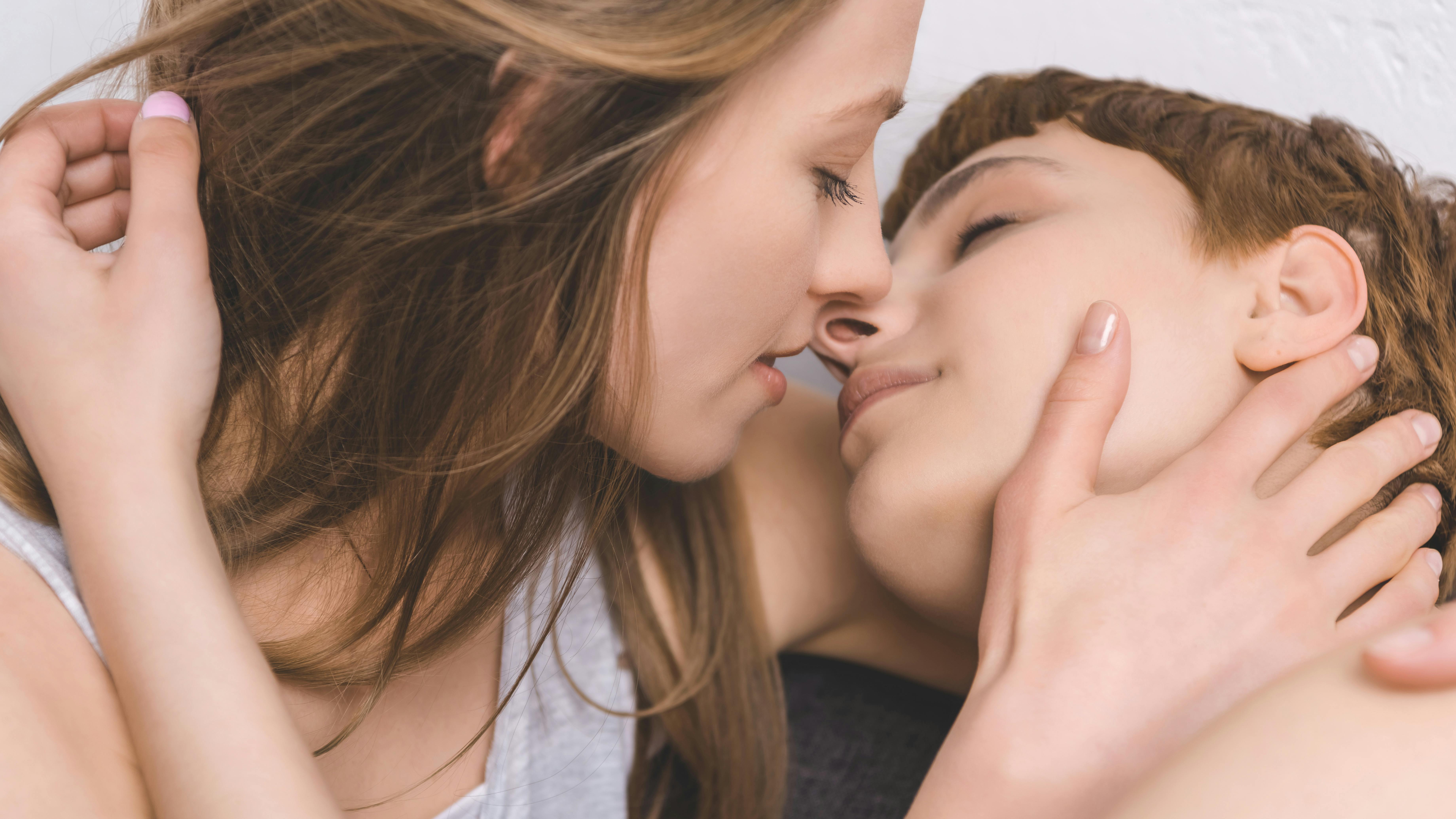close-up shot of passionate young kissing lesbians