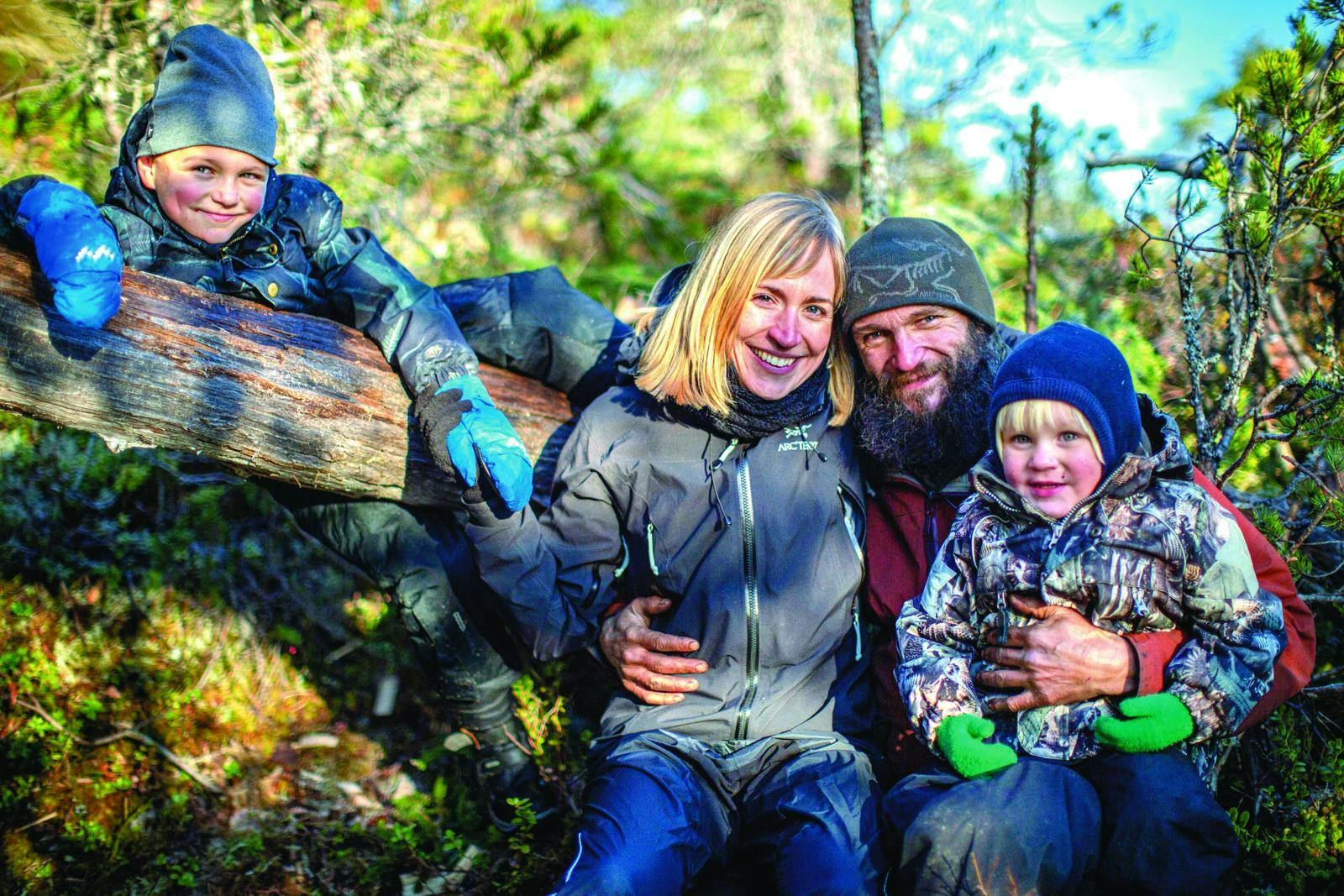 Kim med sin hustru og to sønner.