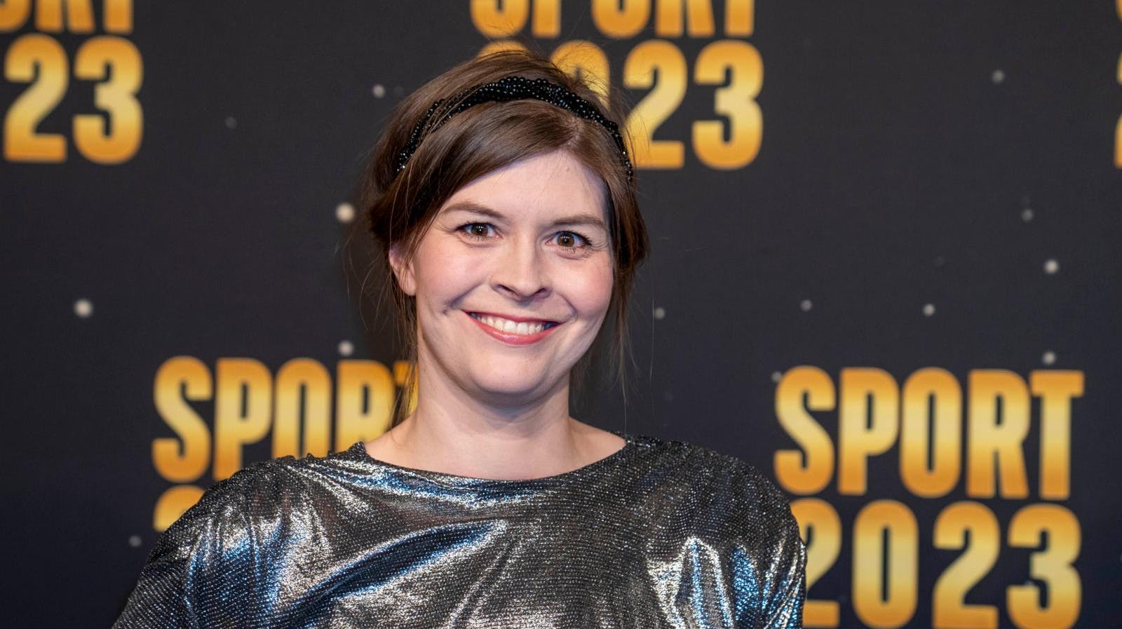 Den tidligere svømmestjerne venter sit andet barn.