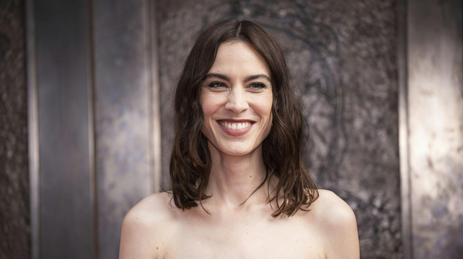 Alexa Chung poses for photographers upon arrival at the National Portrait Gallery Re-Opening on Tuesday, June 20, 2023 in London. (Vianney Le Caer/Invision/AP)