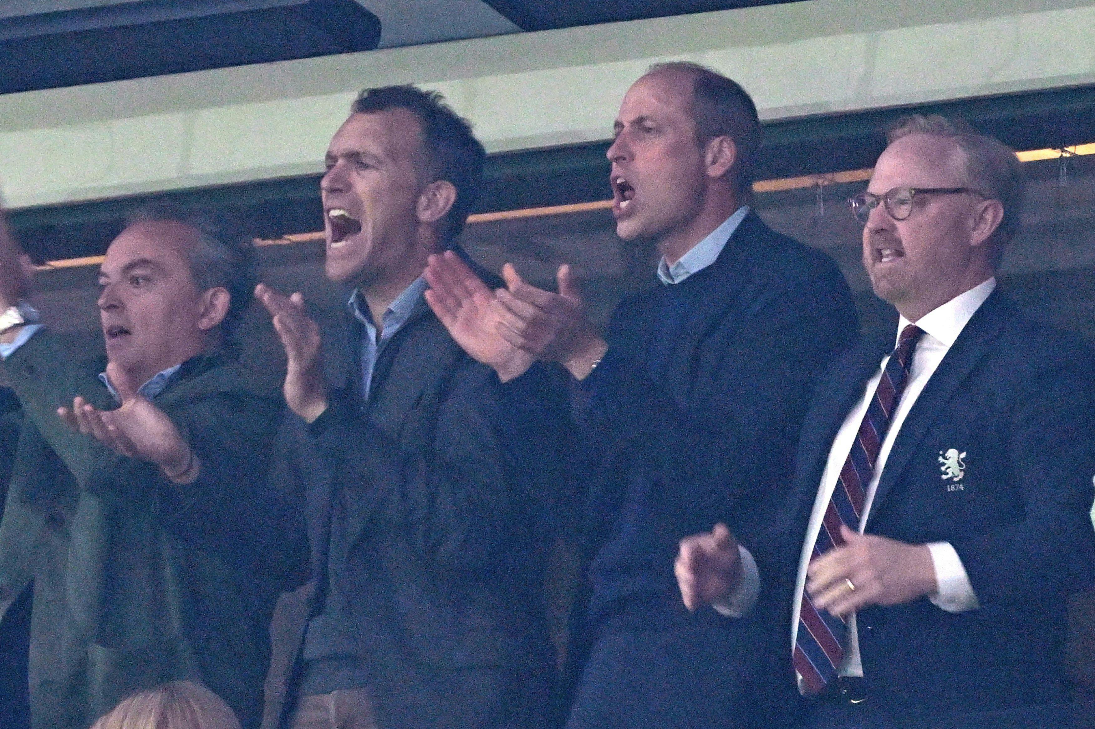 Britain's Prince William, Prince of Wales (2R) reacts during the UEFA Europa Conference League semi final first leg football match between Aston Villa and Olympiakos at Villa Park in Birmingham, central England, on May 2, 2024. (Photo by JUSTIN TALLIS / AFP)