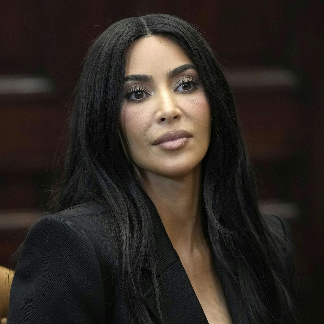 Kim Kardashian listens during a discussion in the Roosevelt Room of the White House in Washington, Thursday, April 25, 2024, on criminal justice reform and the pardons issued by President Joe Biden earlier this month. (AP Photo/Susan Walsh)