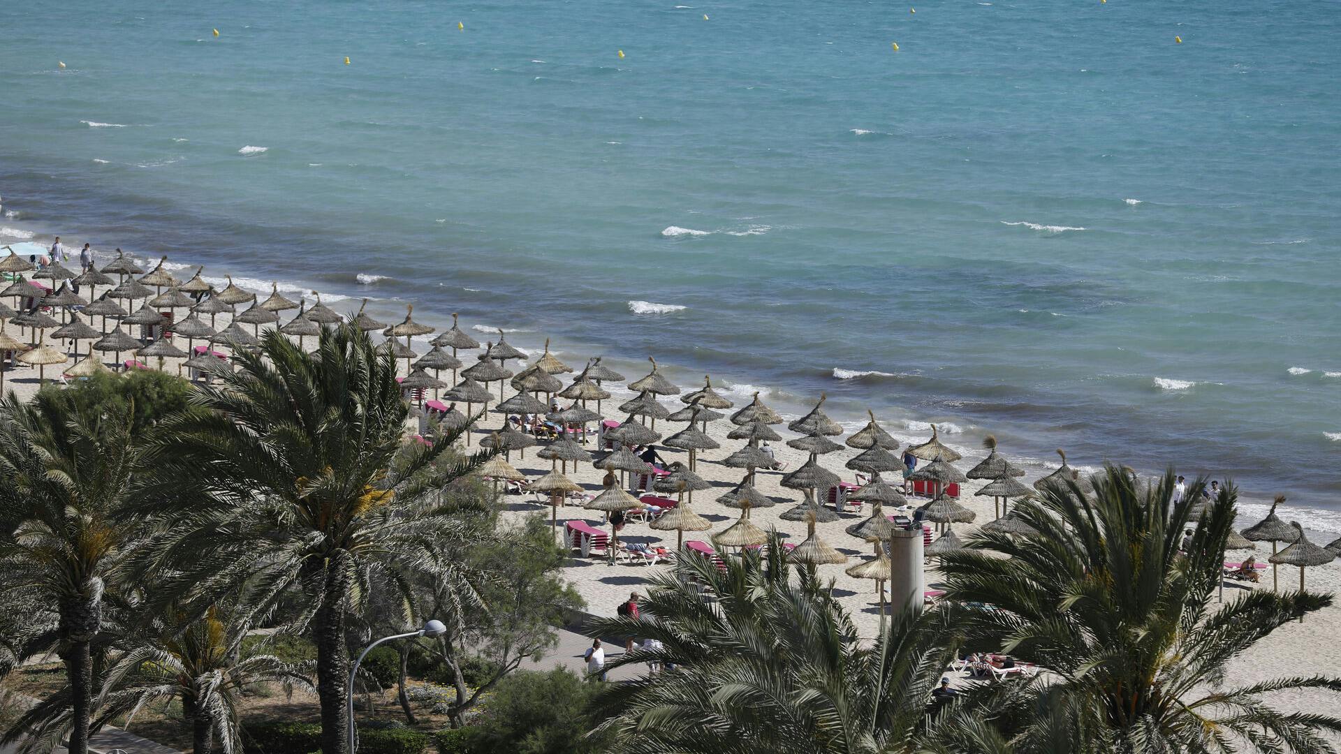 PRODUCTION - 11 May 2022, Spain, Palma: General view of Playa de Palma on the beach of Arenal in Mallorca. The tourism industry on the vacation island of Mallorca, which is popular with Germans, is more optimistic about the future again this year. (to dpa "Hotels in Mallorca hope for good first season without Corona rules") Photo by: Clara Margais/picture-alliance/dpa/AP Images