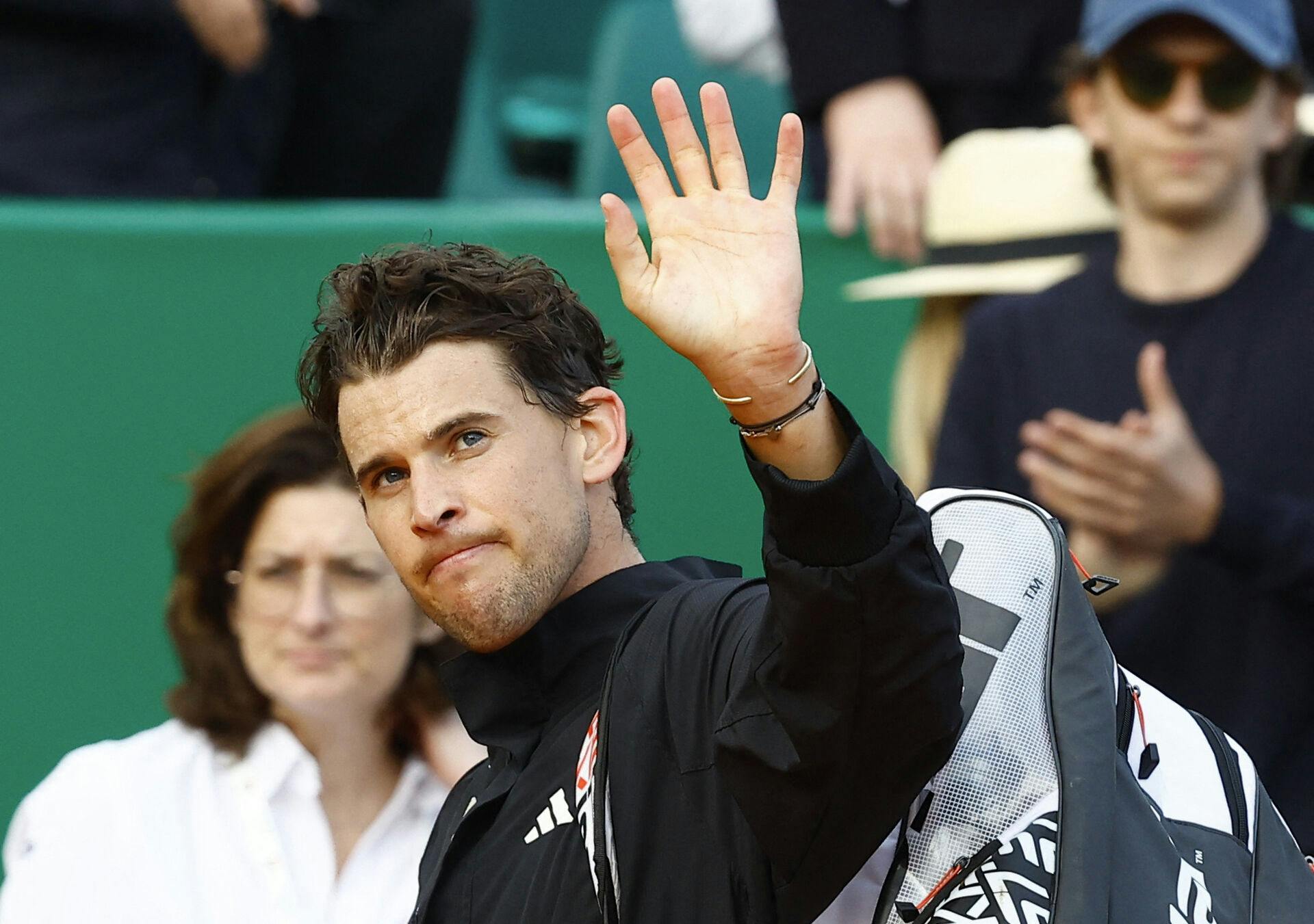 Tennis - ATP Masters 1000 - Monte Carlo Masters - Monte-Carlo Country Club, Roquebrune-Cap-Martin, France - April 12, 2023 Austria's Dominic Thiem waves as he walks off after losing his round of 32 match against Denmark's Holger Rune REUTERS/Eric Gaillard