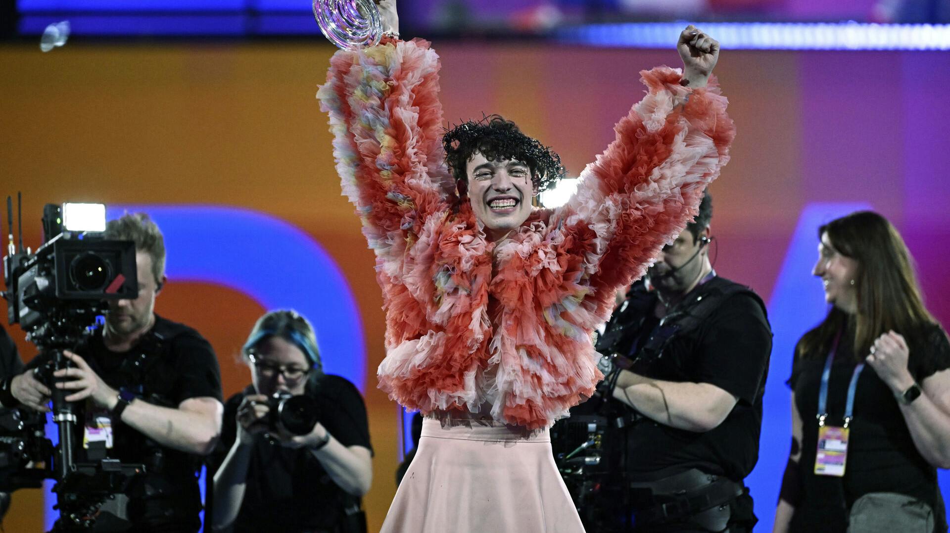 Nemo, representing Switzerland, with the song "The Code, " wins the final of the 68th edition of the Eurovision Song Contest at the Malmö Arena, in Malmø, Sweden, Saturday, May 11, 2024. (Jessica Gow/TT News Agency via AP)
