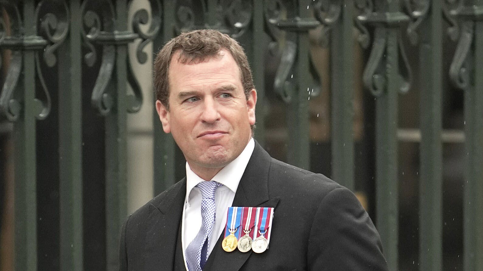 Peter Phillips arrives to attend Britain's King Charles III and Queen Consort Camilla's coronation ceremony, at Westminster Abbey, in London, Saturday, May 6, 2023. (AP Photo/Kin Cheung)
