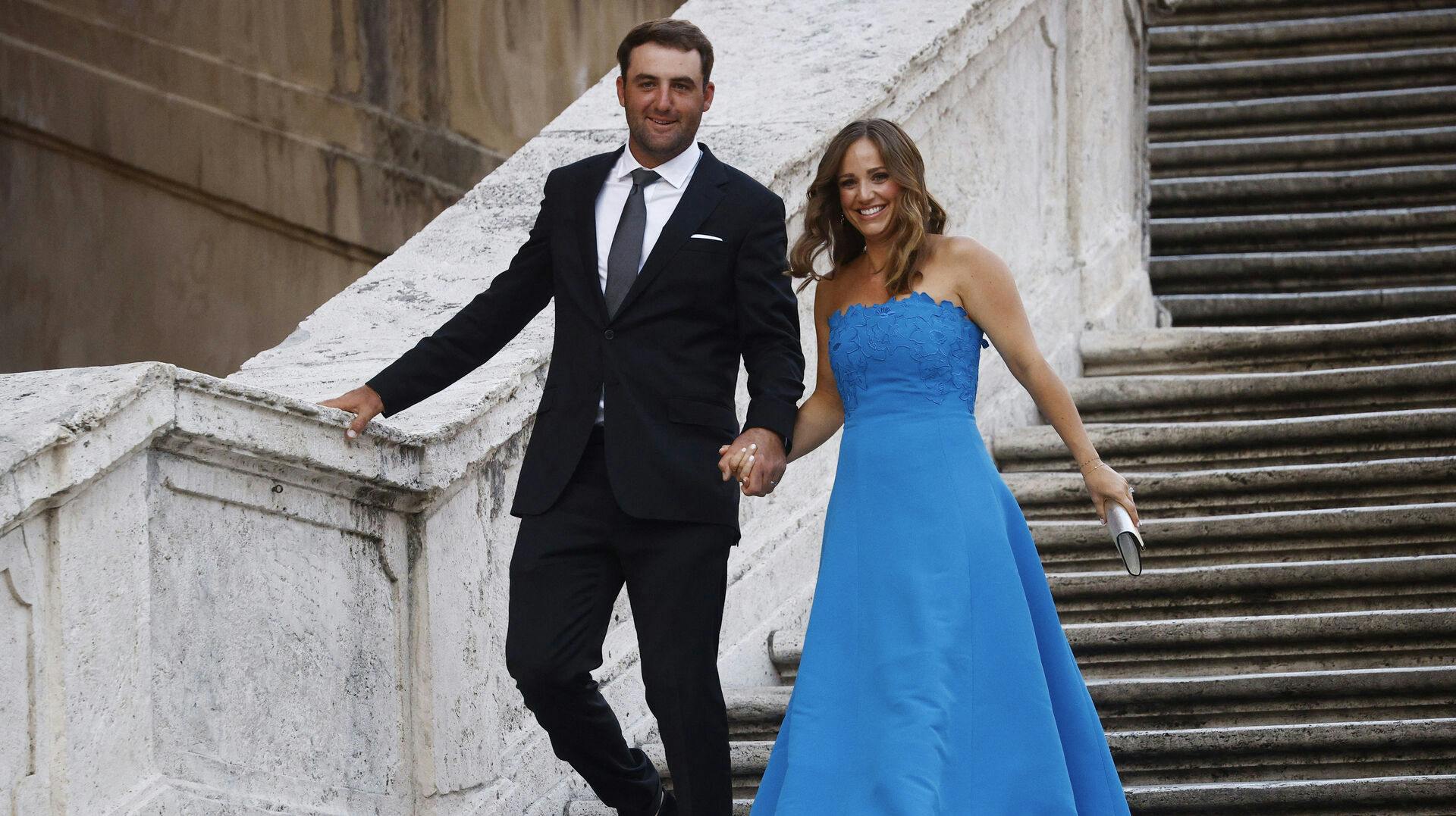 Golf - The 2023 Ryder Cup - Rome, Italy - September 27, 2023 Team USA's Scottie Scheffler and his wife Meredith Scheffler are pictured on the Spanish steps and stairs at Piazza di Spagna in Rome REUTERS/Guglielmo Mangiapane