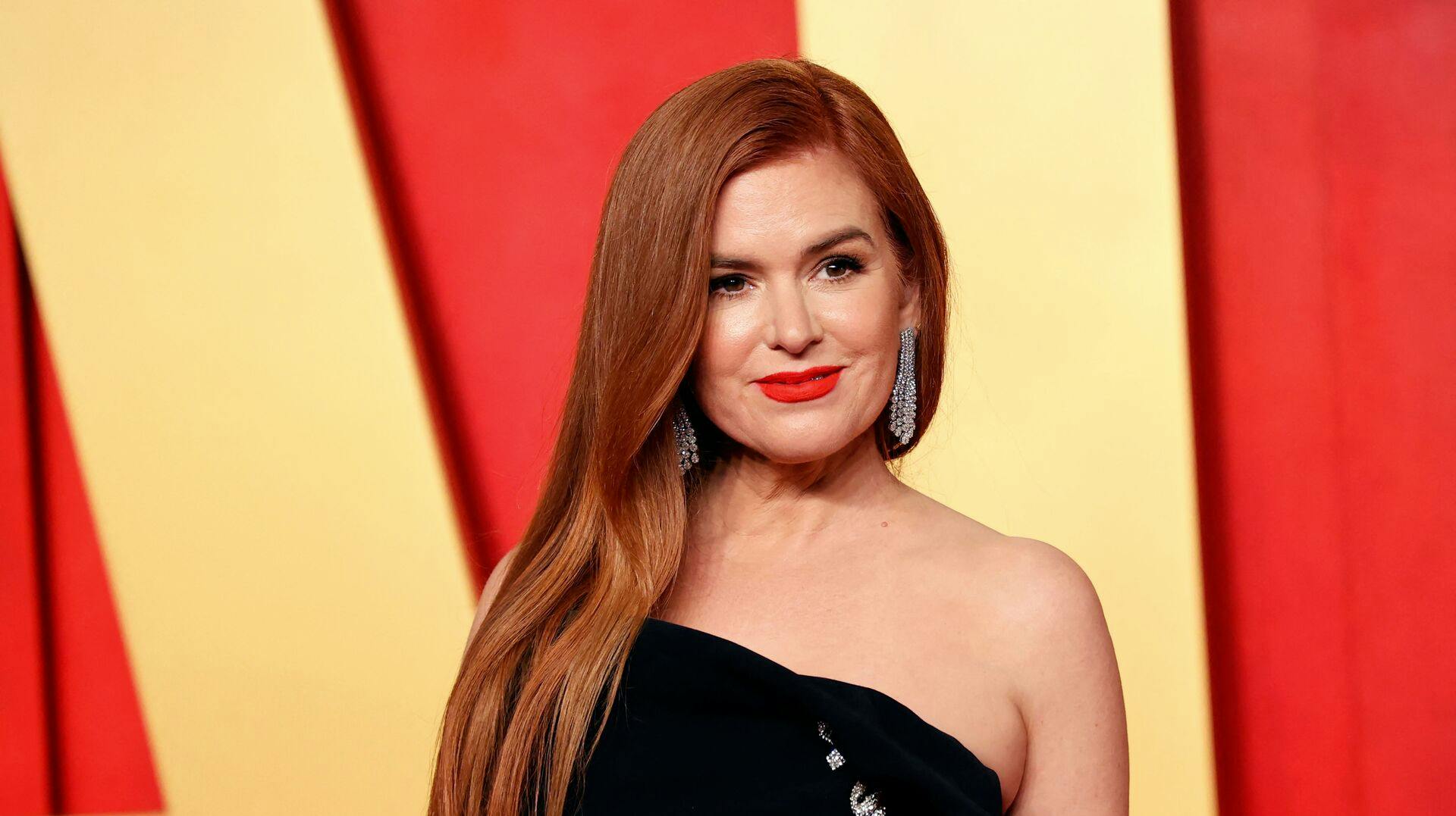 Actress Isla Fisher attends the Vanity Fair Oscars Party at the Wallis Annenberg Center for the Performing Arts in Beverly Hills, California, on March 10, 2024. (Photo by Michael TRAN / AFP)