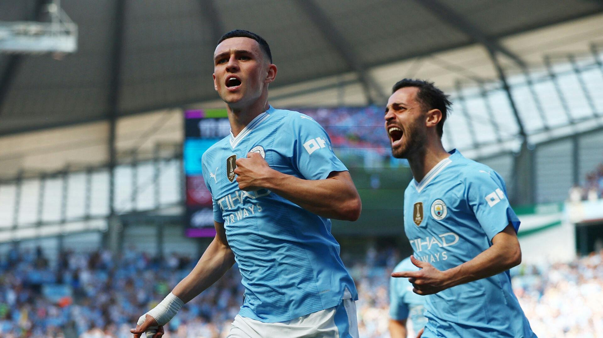 Phil Foden (tv) og Bernado Silva (th) kan igen kalde sig de bedste i England.