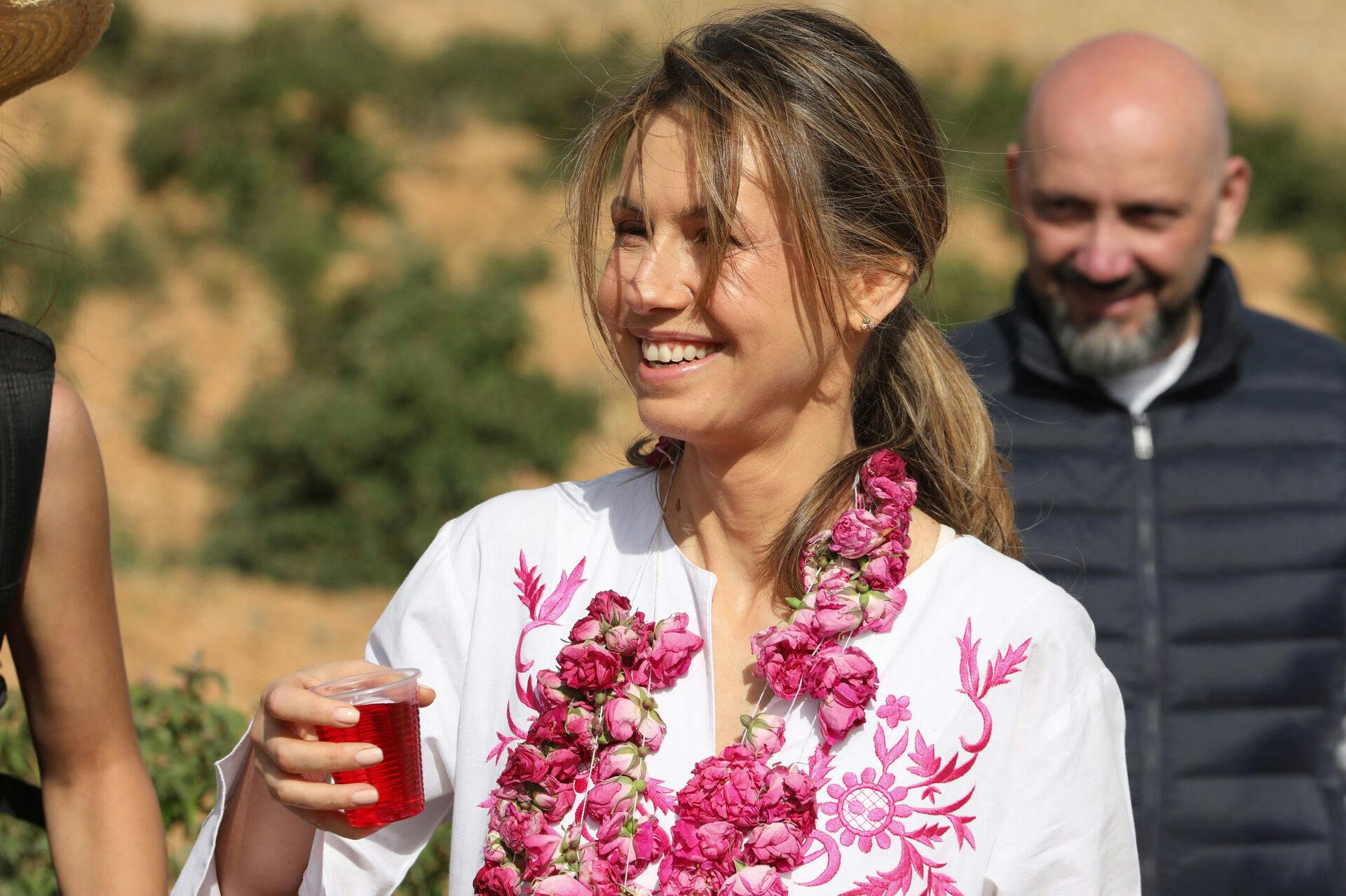 Syrian First Lady Asma al-Assad attends the harvest of Damascena (Damask) roses in the village of al-Marah, in the Damascus countryside, on May 25, 2023. LOUAI BESHARA / AFP