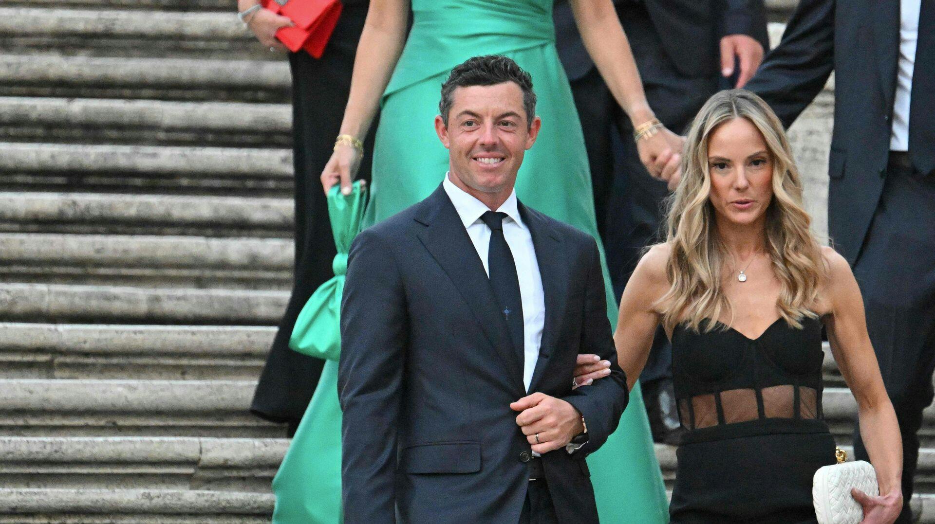 Rory McIlroy med sin kommende ekskone, Erica Stroll. 