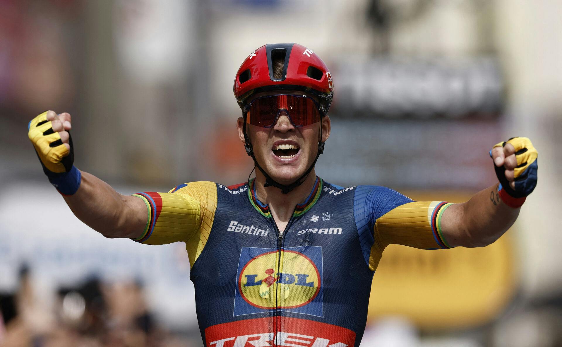 Cycling - Tour de France - Stage 8 - Libourne to Limoges - France - July 8, 2023 Lidl-Trek's Mads Pedersen celebrates as he crosses the finish line to win stage 8 REUTERS/Benoit Tessier