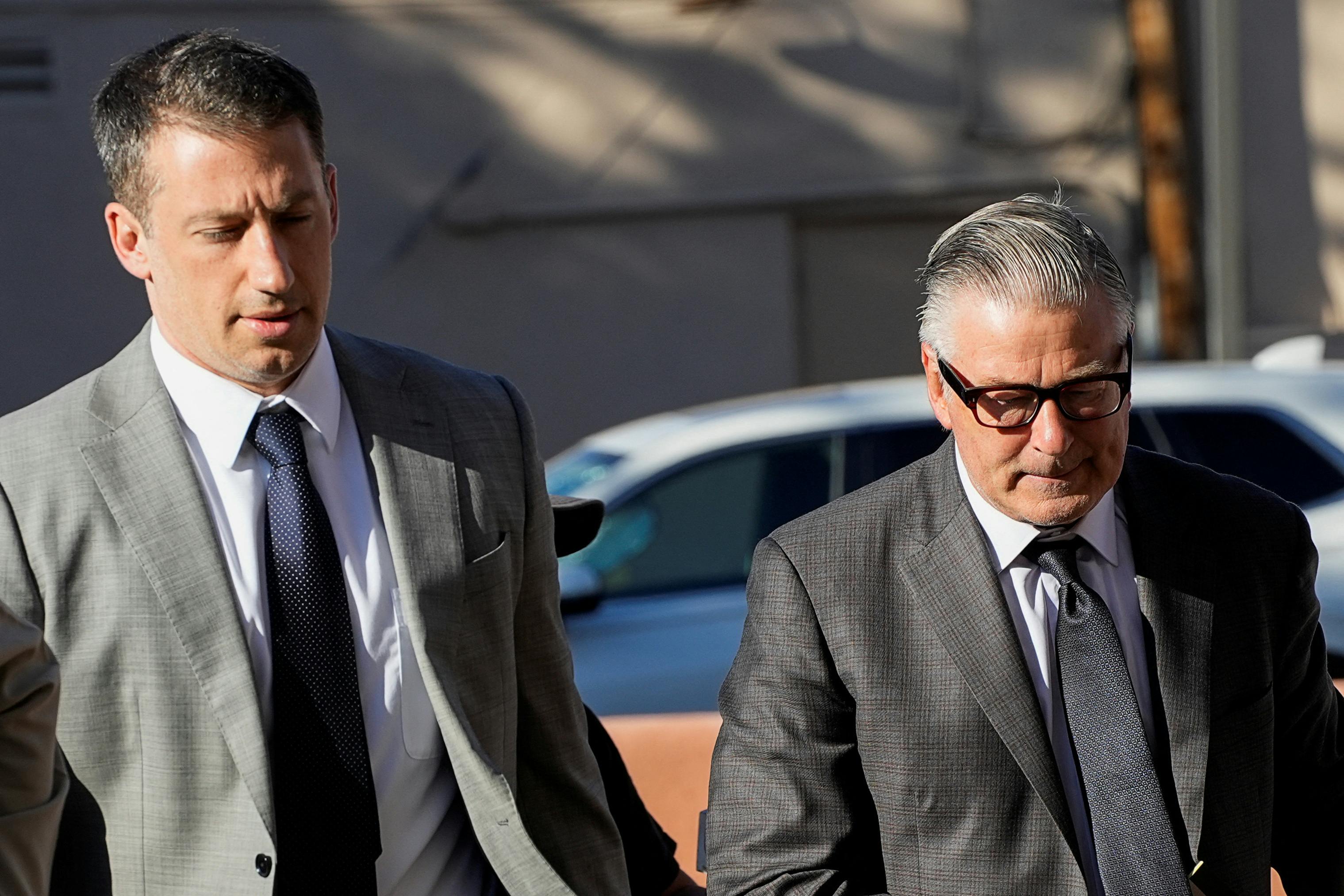 Actor Alec Baldwin walks towards the courthouse, as jury selection begins his manslaughter trial for the 2021 fatal shooting of cinematographer Halyna Hutchins during the filming of the Western movie "Rust", in Santa Fe, New Mexico, U.S. July 9, 2024. REUTERS/Ramsay de Give