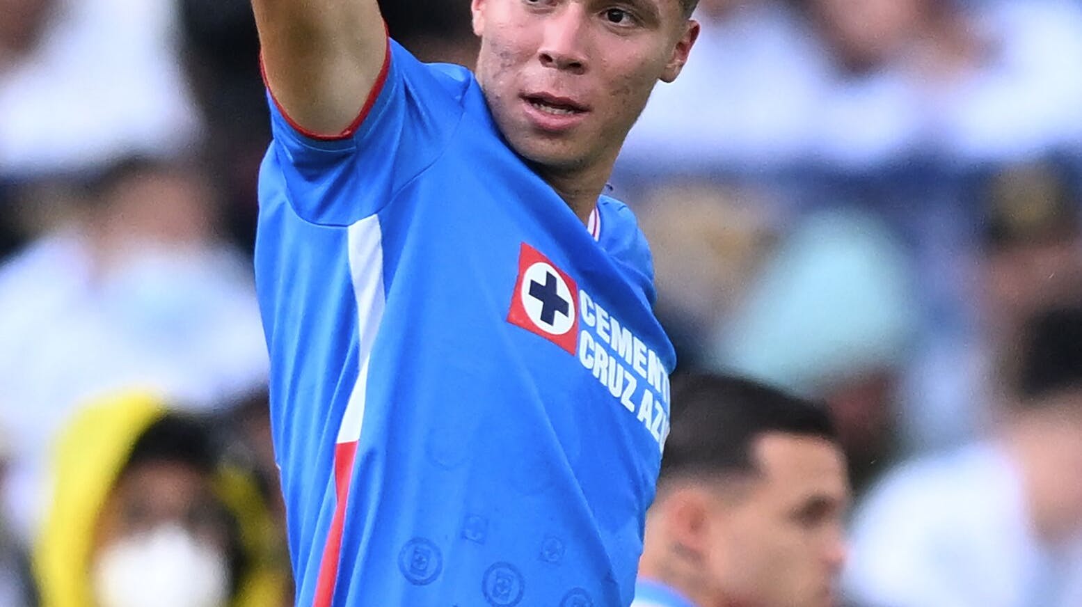 Cruz Azul's Rodrigo Huescas celebrates after scoring againsts Pumas during the Mexican Apertura football tournament match between Pumas and Cruz Azul at the Olimpico stadium in Mexico City, on September 18, 2022. RODRIGO ARANGUA / AFP