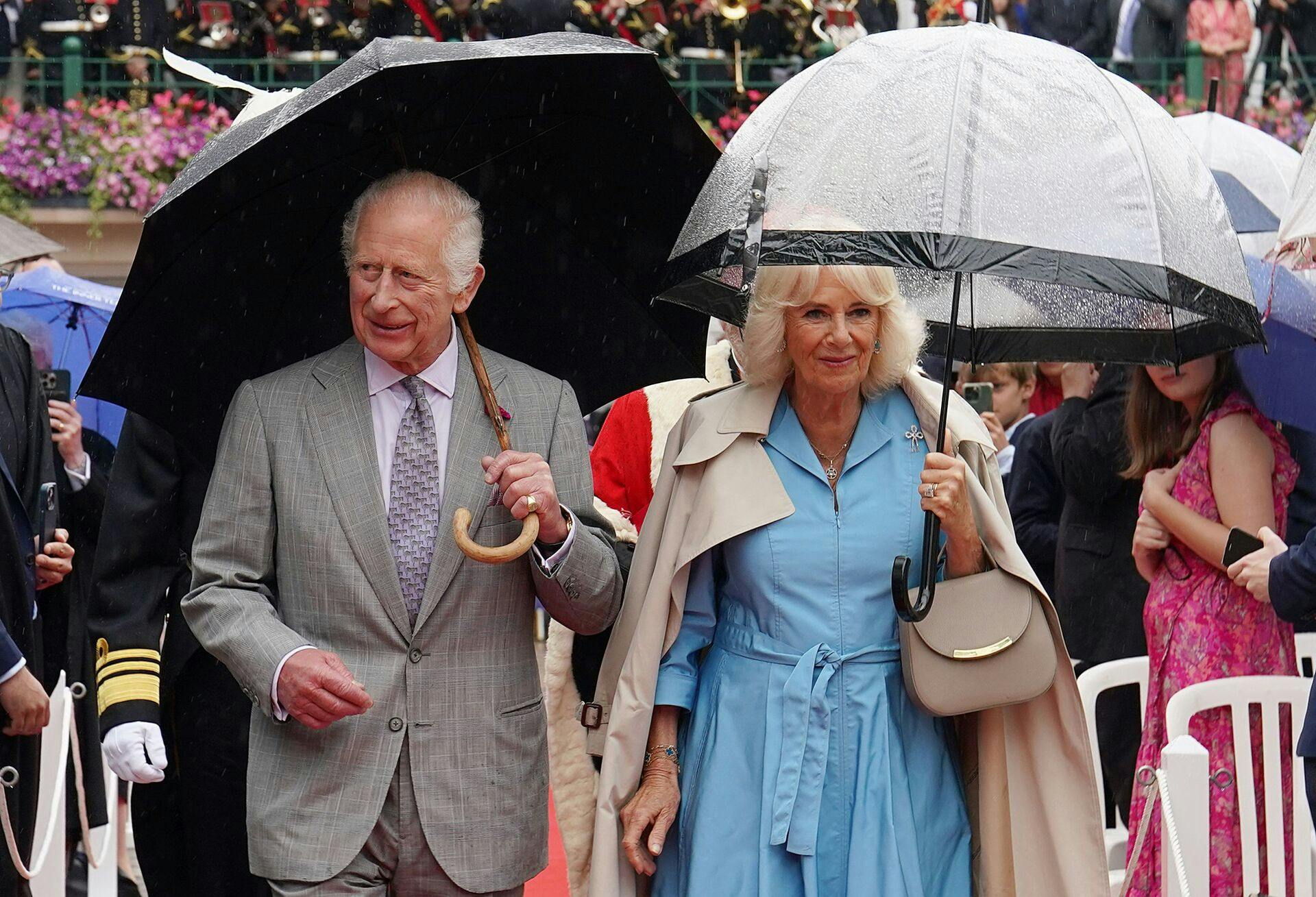 Britain's King Charles III and Britain's Queen Camilla visit Royal Square for a Special Sitting of the States Assembly and Sitting of the Royal Court in St Helier on July 15, 2024. (Photo by Arthur EDWARDS / POOL / AFP)