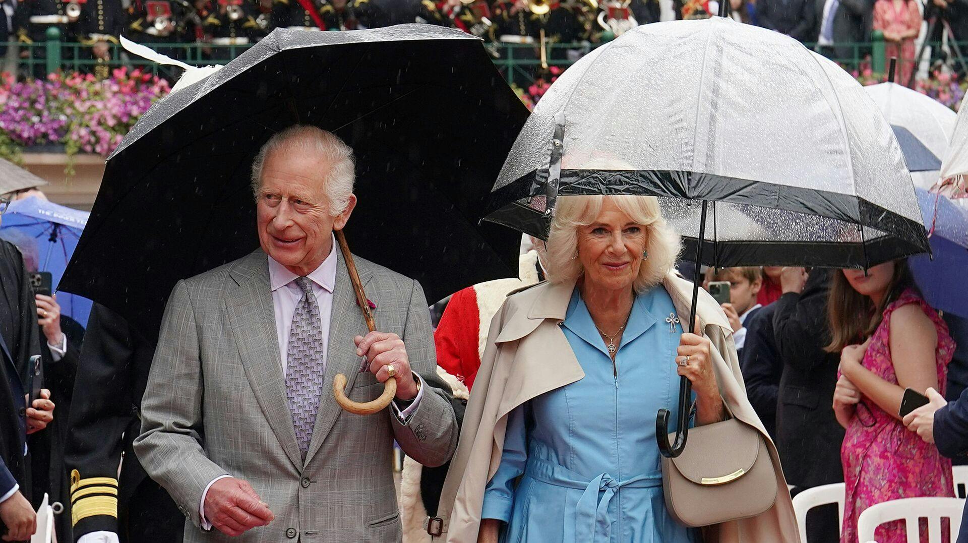 Britain's King Charles III and Britain's Queen Camilla visit Royal Square for a Special Sitting of the States Assembly and Sitting of the Royal Court in St Helier on July 15, 2024. (Photo by Arthur EDWARDS / POOL / AFP)