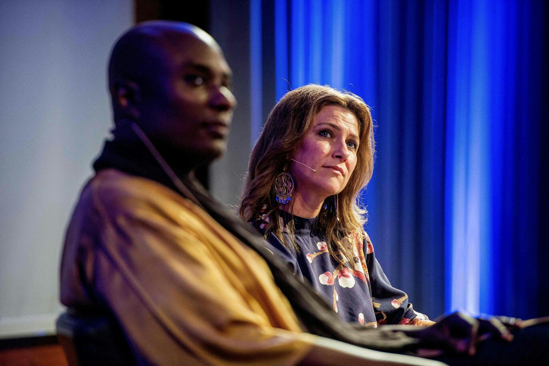 (FILES) In this file photo taken on May 20, 2019 Norwegian princess Maertha poses on stage with shaman Durek Verrett (L) during a session at Clarion hotel in Stavanger, Norway, on May 20, 2019. - Norway's royal court on June 7, 2022 announced the engagement of Princess Martha Louise to her boyfriend and self-professed shaman Durek Verrett. (Photo by Carina Johansen / various sources / AFP) / Norway OUT