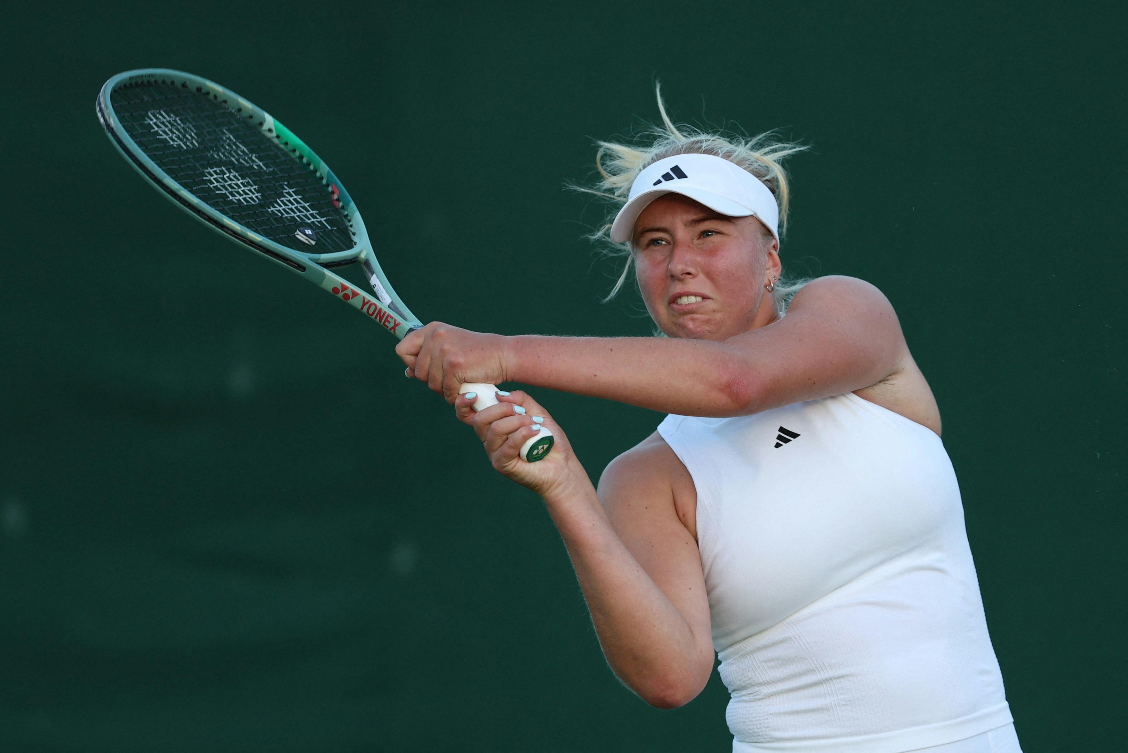 Tennis - Wimbledon - All England Lawn Tennis and Croquet Club, London, Britain - July 2, 2024 Denmark's Clara Tauson in action during her first round match against Danielle Collins of the U.S. REUTERS/Paul Childs